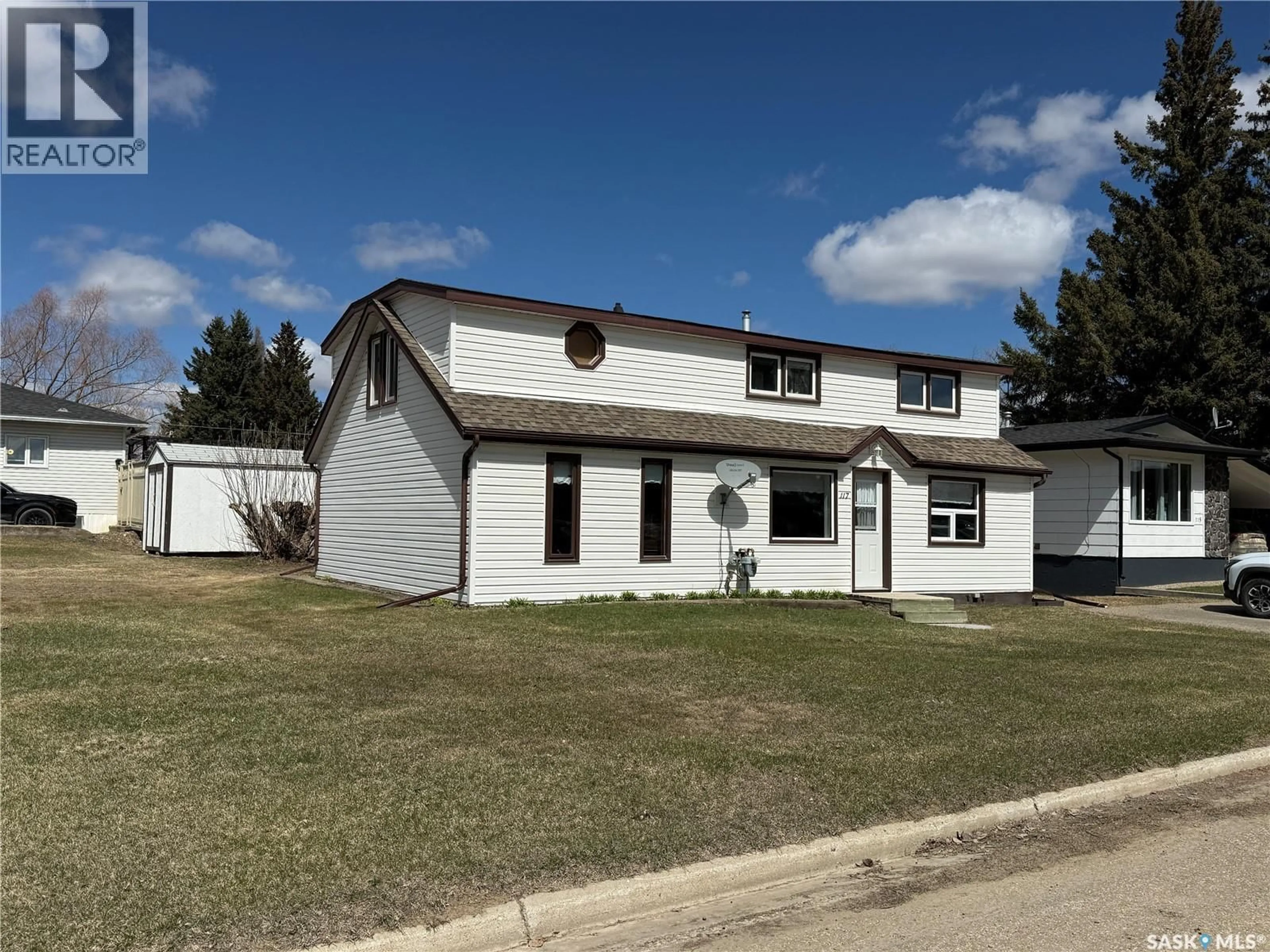 Home with vinyl exterior material, street for 117 3RD AVENUE, Watson Saskatchewan S0K4V0