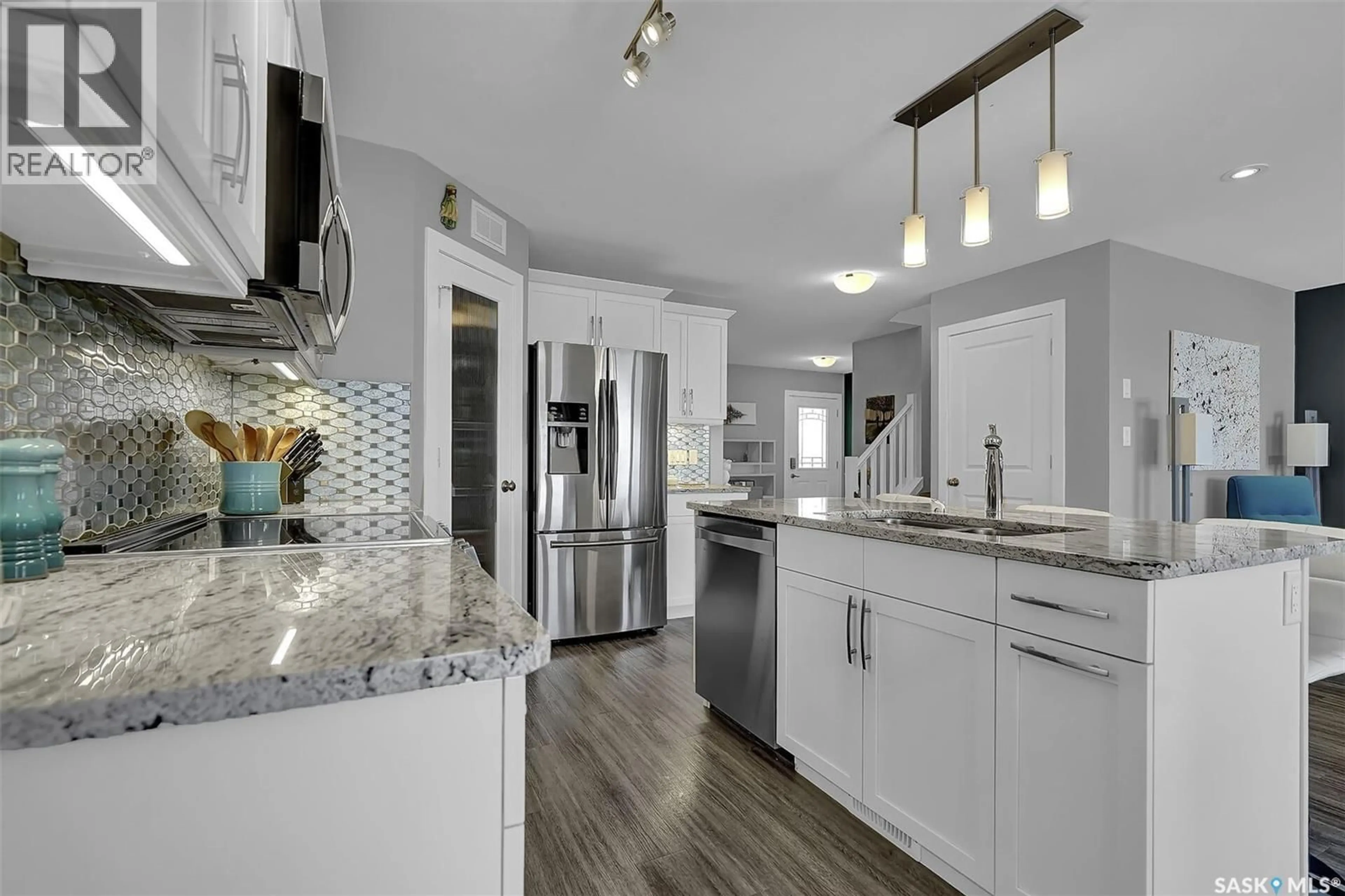 Open concept kitchen, ceramic/tile floor for 8933 KESTRAL DRIVE, Regina Saskatchewan S4Y0C2