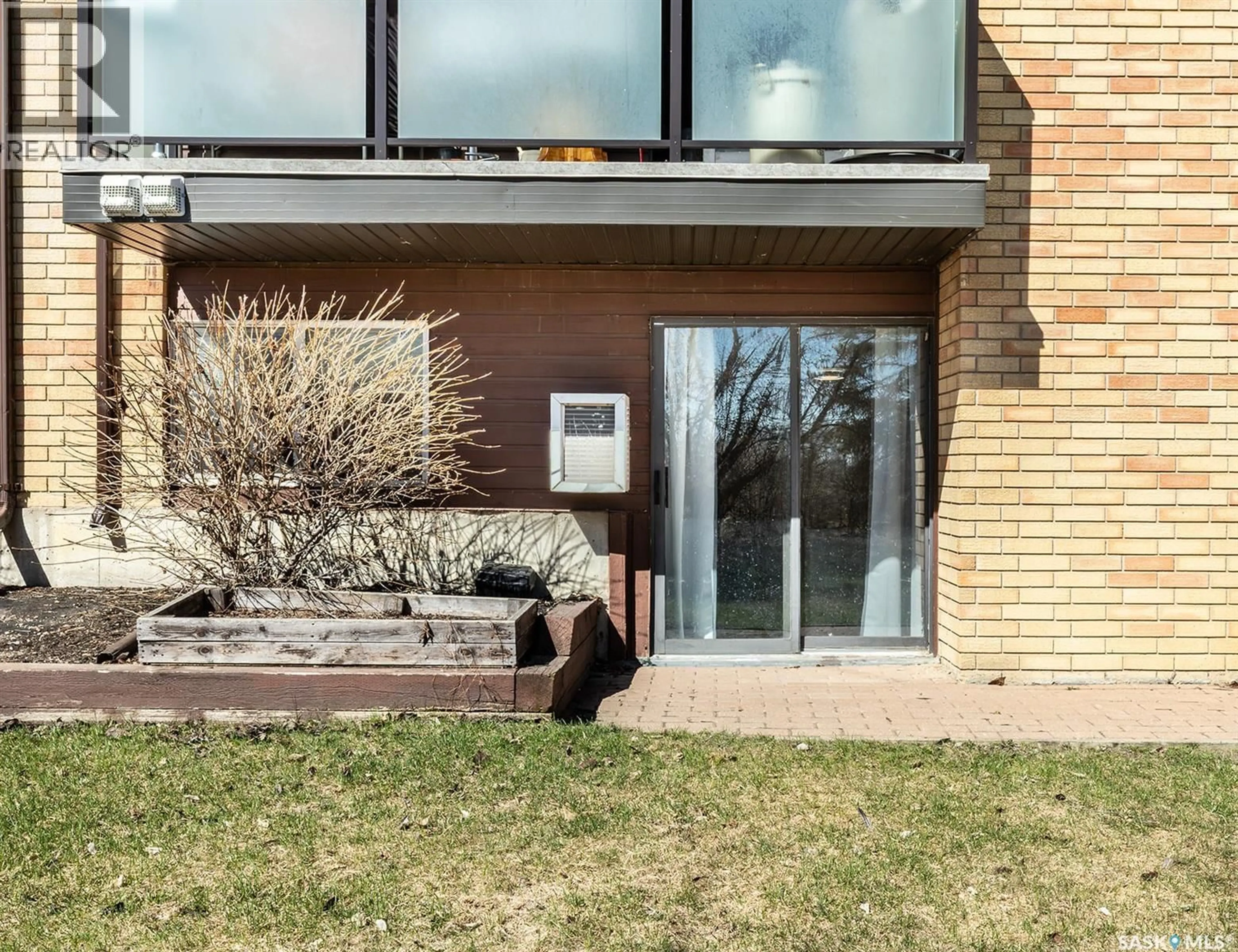 Home with brick exterior material, street for 102 - 411 TAIT COURT, Saskatoon Saskatchewan S7H5L3