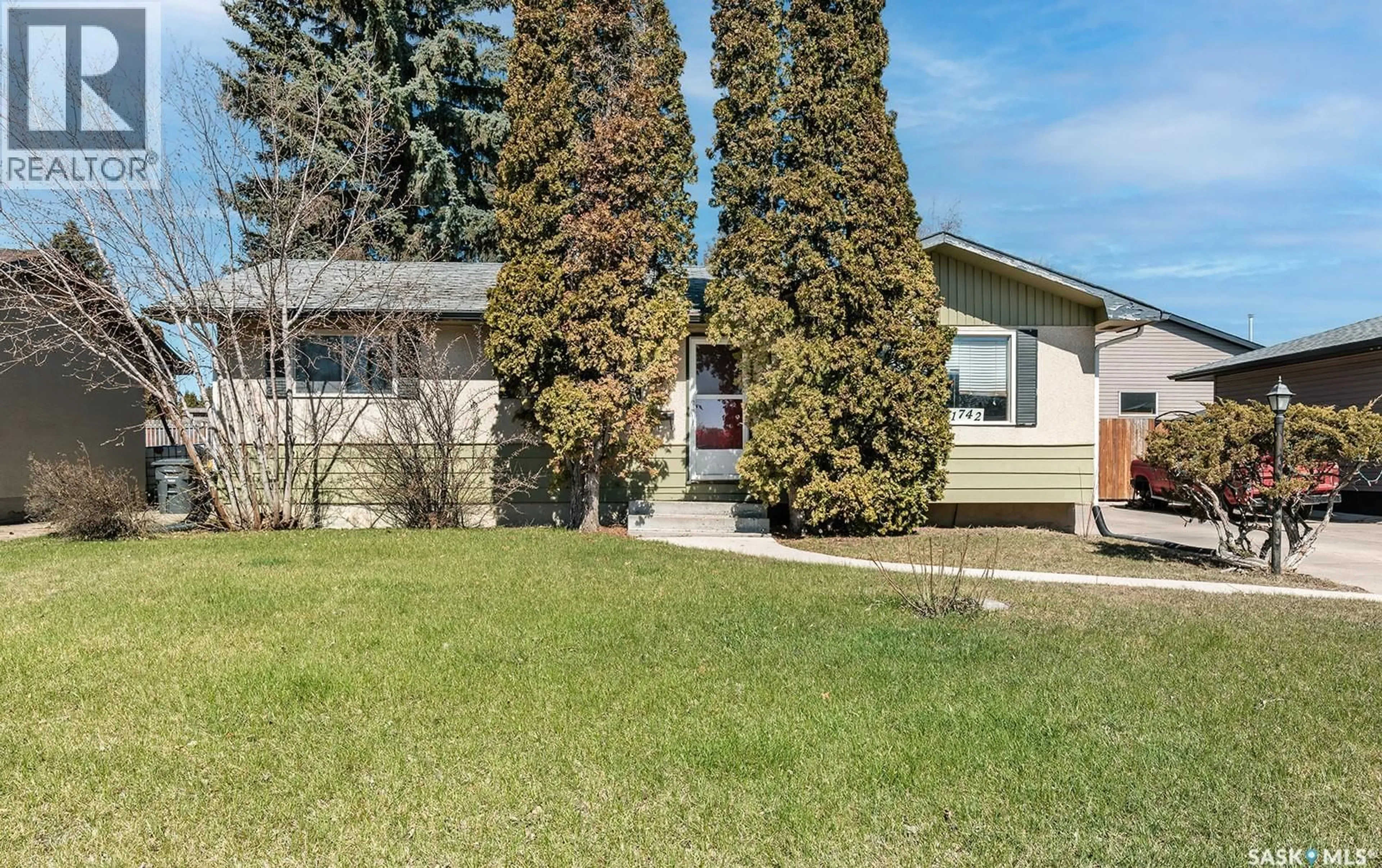Home with vinyl exterior material, street for 1742 RICHARDSON ROAD, Saskatoon Saskatchewan S7L4B5