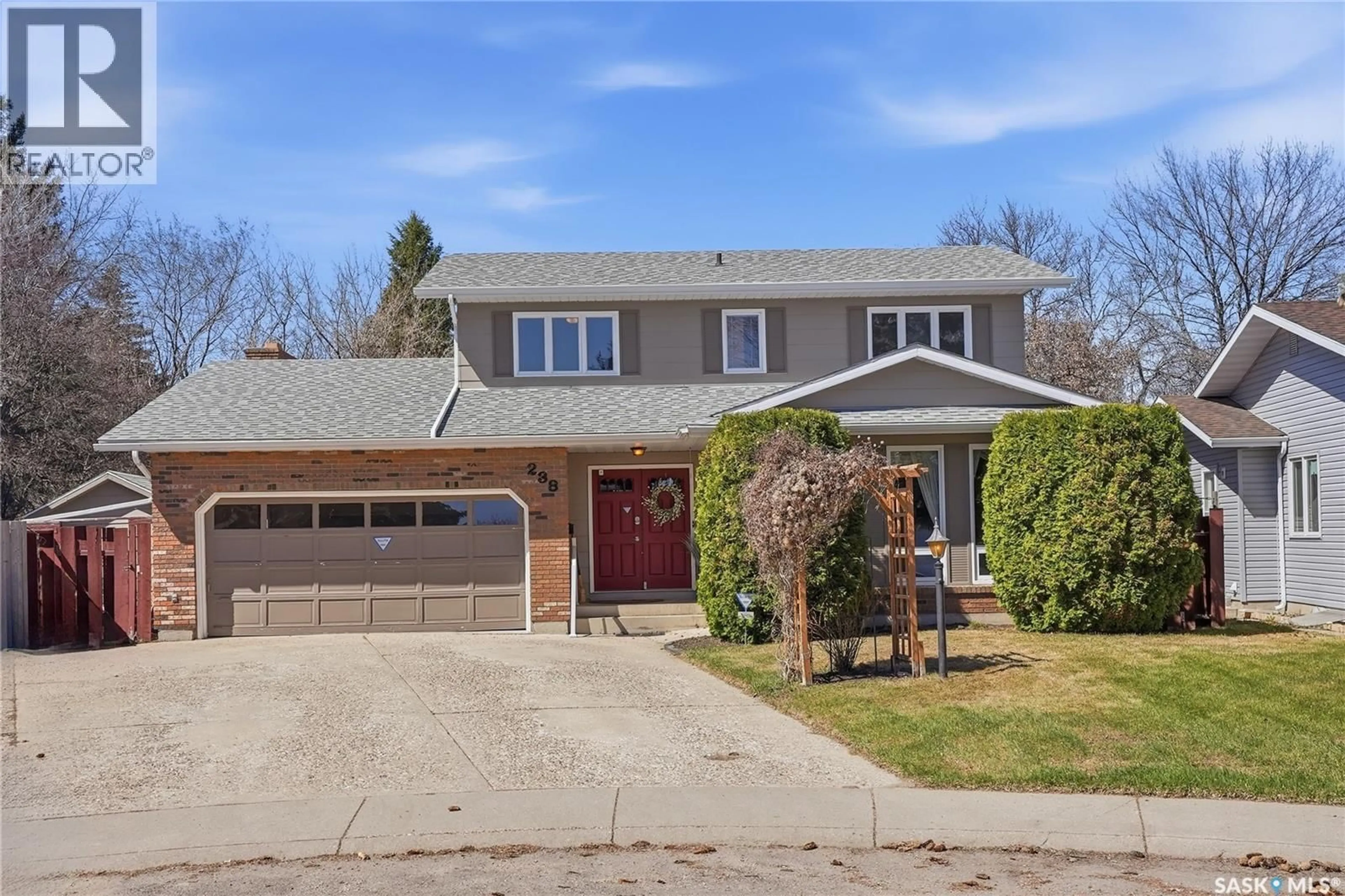 Home with brick exterior material, street for 238 HAIGHT PLACE, Saskatoon Saskatchewan S7H4W2