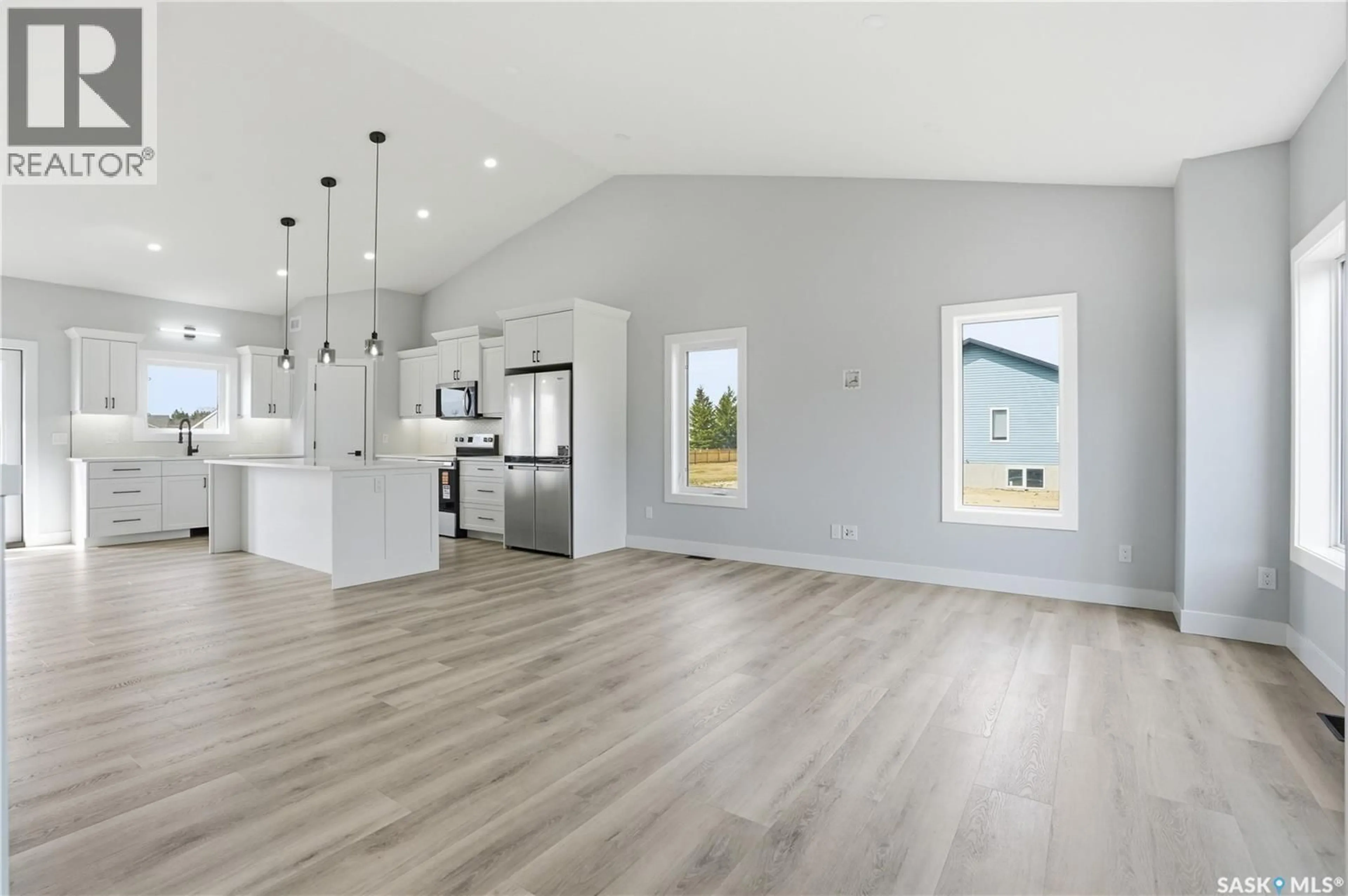 Open concept kitchen, wood/laminate floor for 208 2ND STREET, Waldheim Saskatchewan S0K4R0