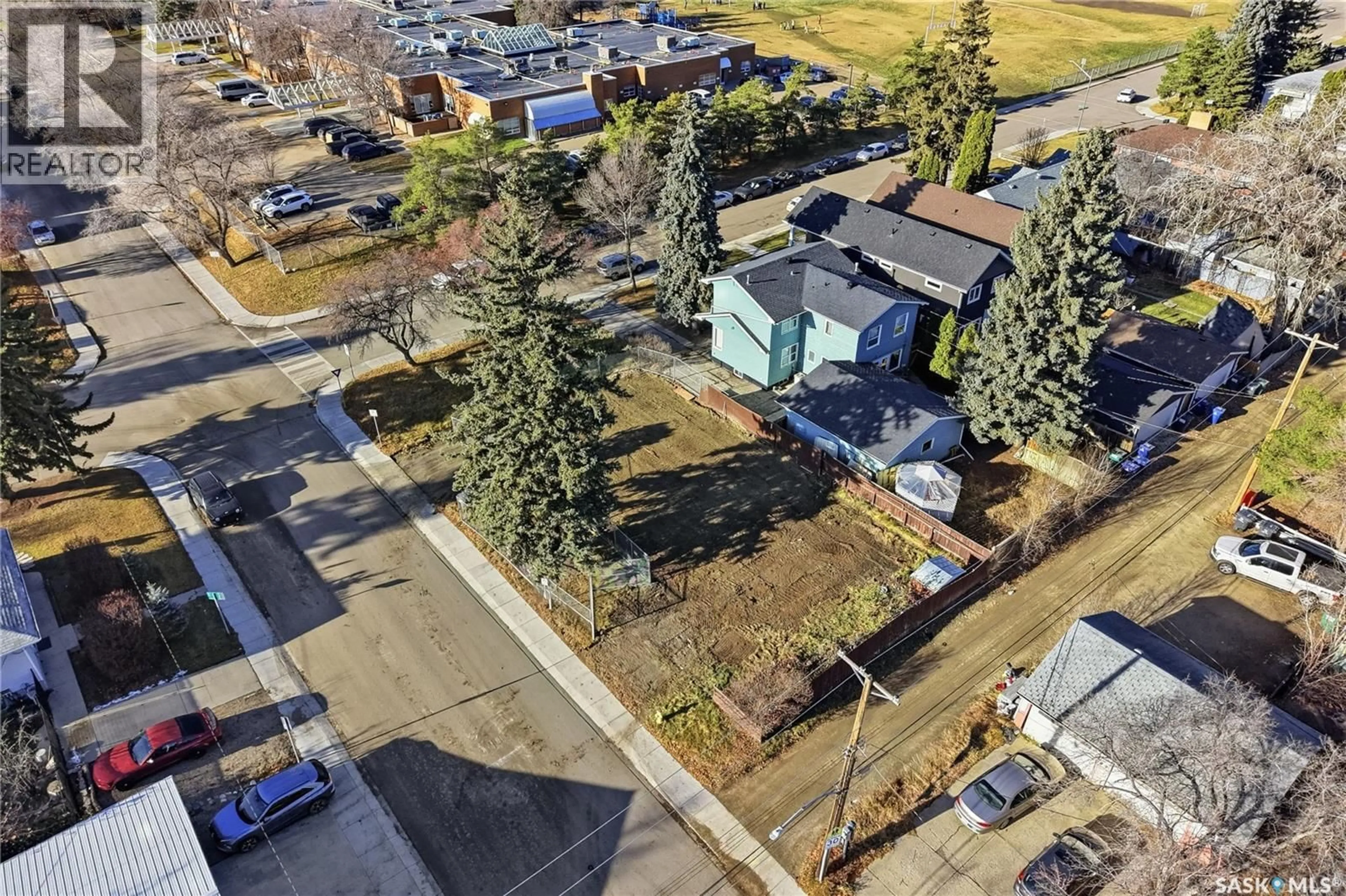 A pic from outside/outdoor area/front of a property/back of a property/a pic from drone, street for 1401 COLONY STREET, Saskatoon Saskatchewan S7N0S8
