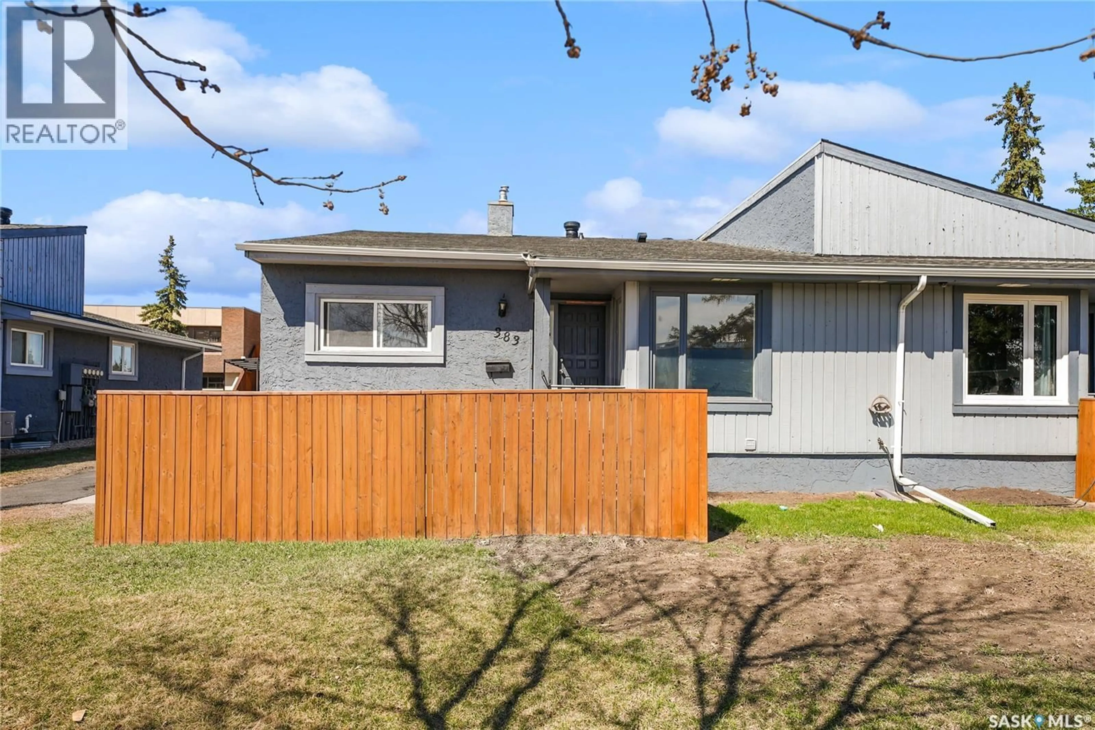 Home with vinyl exterior material, street for 383 FINES DRIVE, Regina Saskatchewan S4N5T3
