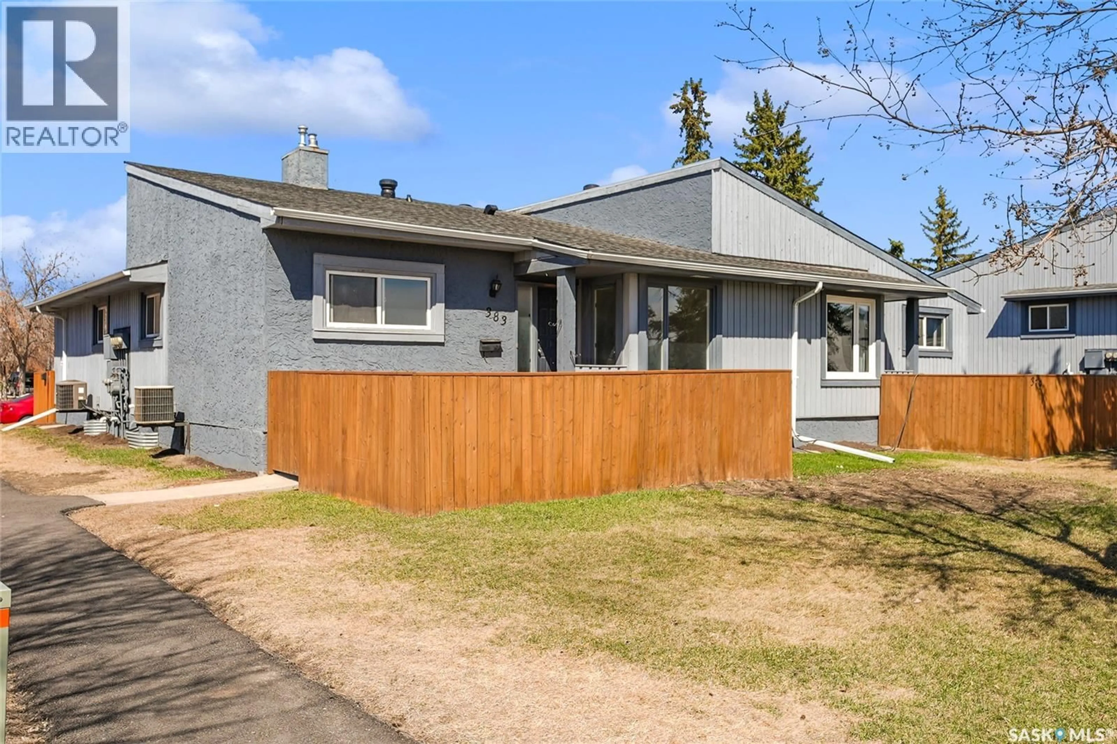 Home with vinyl exterior material, street for 383 FINES DRIVE, Regina Saskatchewan S4N5T3