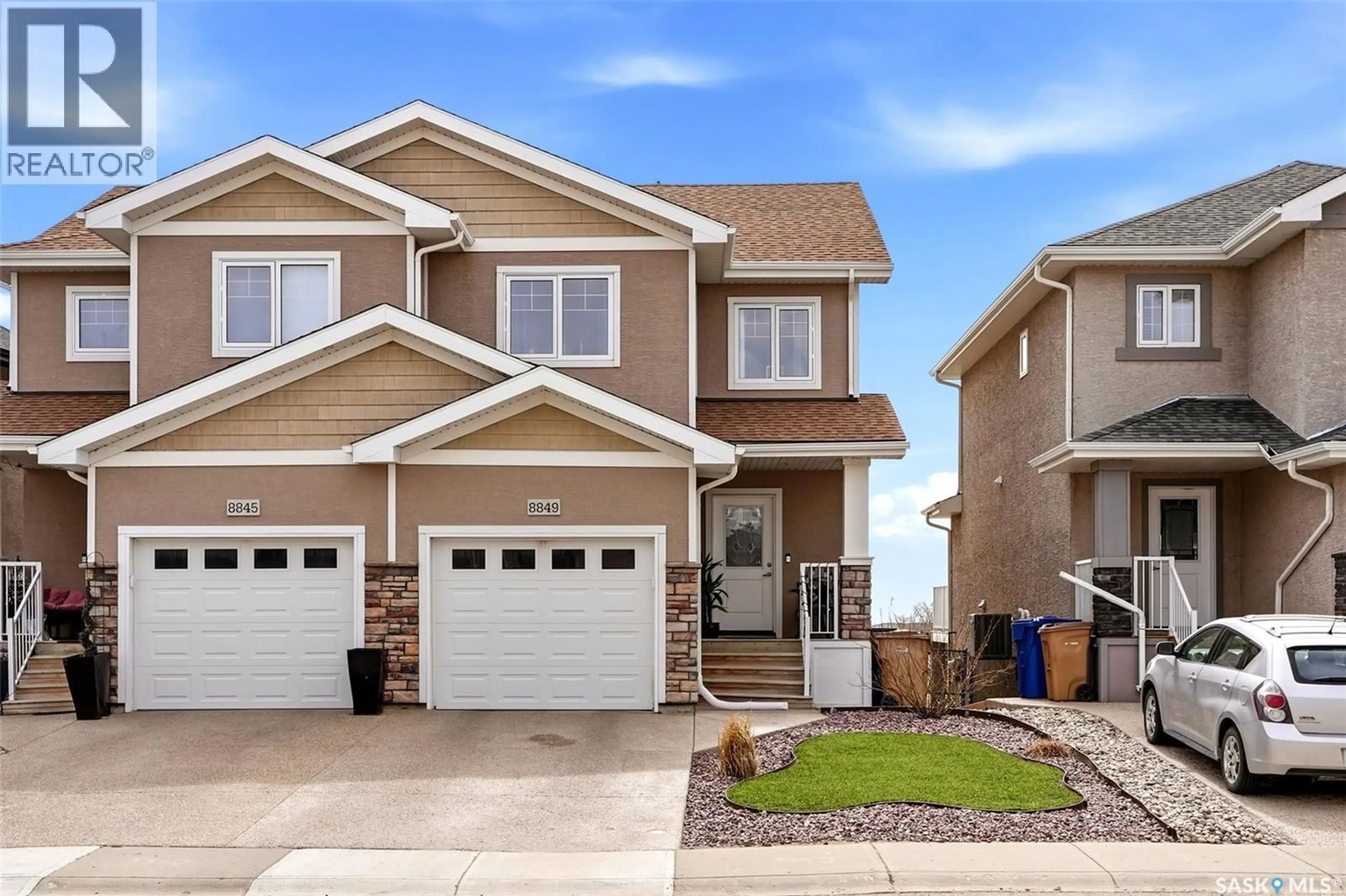 Home with vinyl exterior material, street for 8849 KESTRAL DRIVE, Regina Saskatchewan S4Y1H6