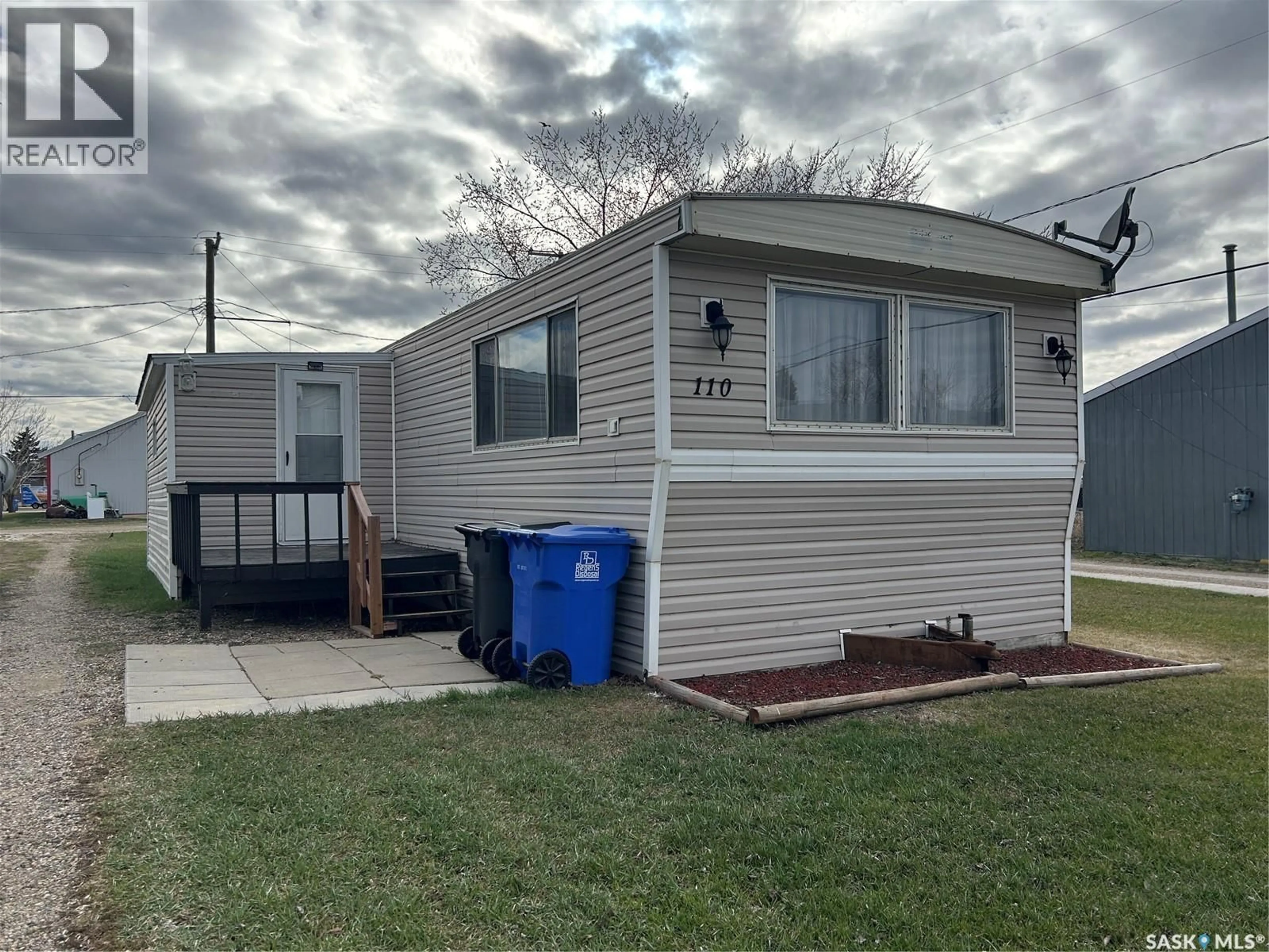 Home with vinyl exterior material, street for 110 4TH STREET, Alameda Saskatchewan S0C0A0
