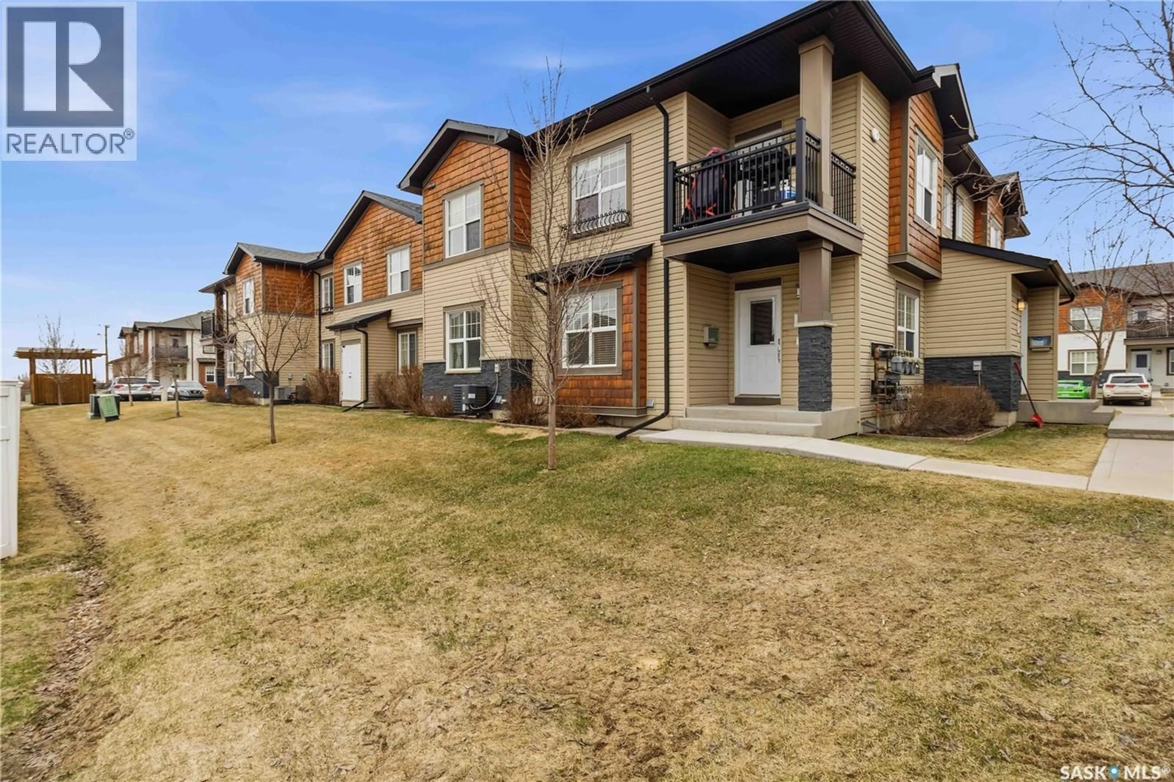 A pic from outside/outdoor area/front of a property/back of a property/a pic from drone, street for 202 1015 PATRICK CRESCENT, Saskatoon Saskatchewan S7W0M6