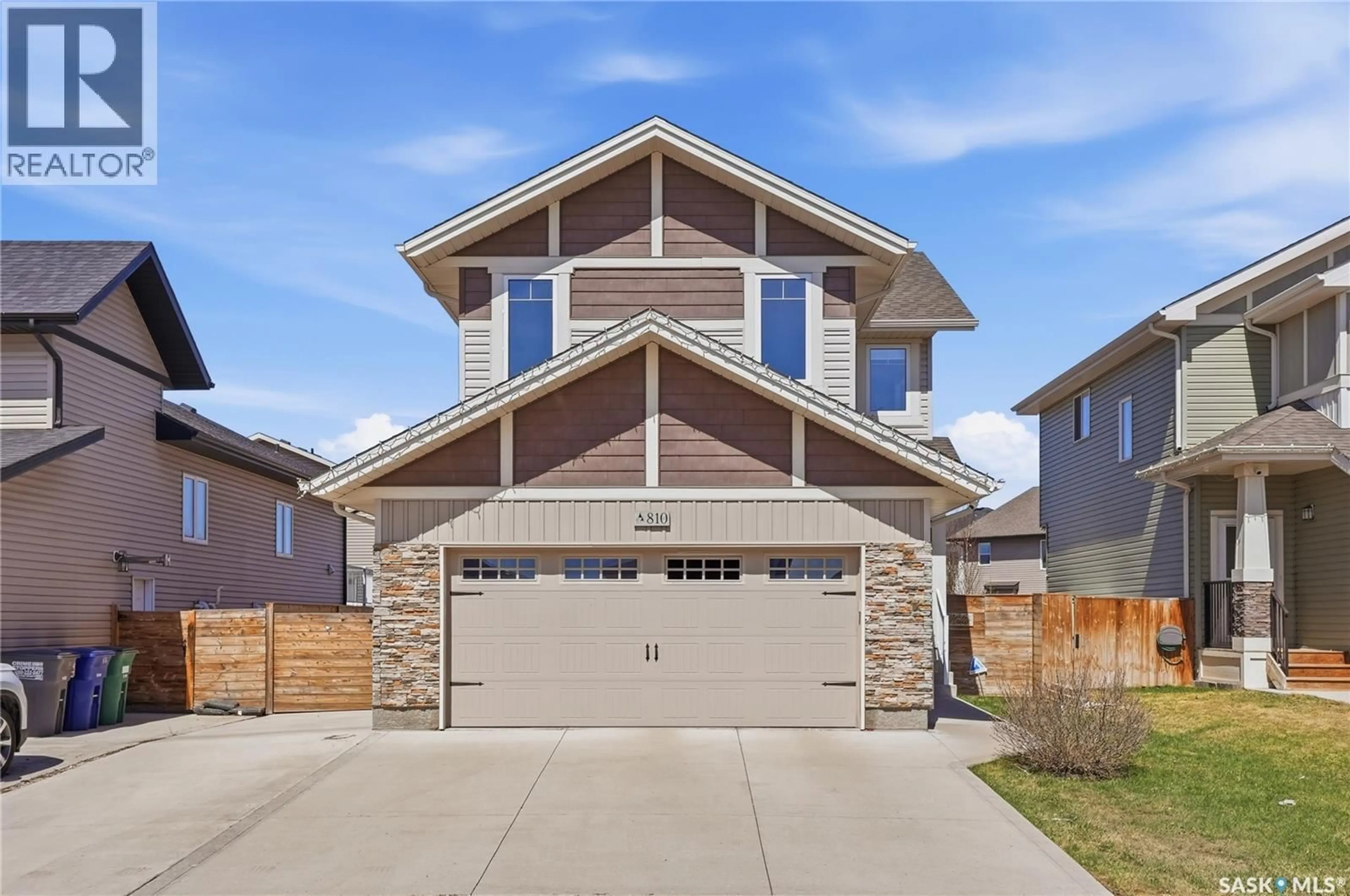 Home with brick exterior material, street for 810 CHILDERS RISE, Saskatoon Saskatchewan S7L6T9