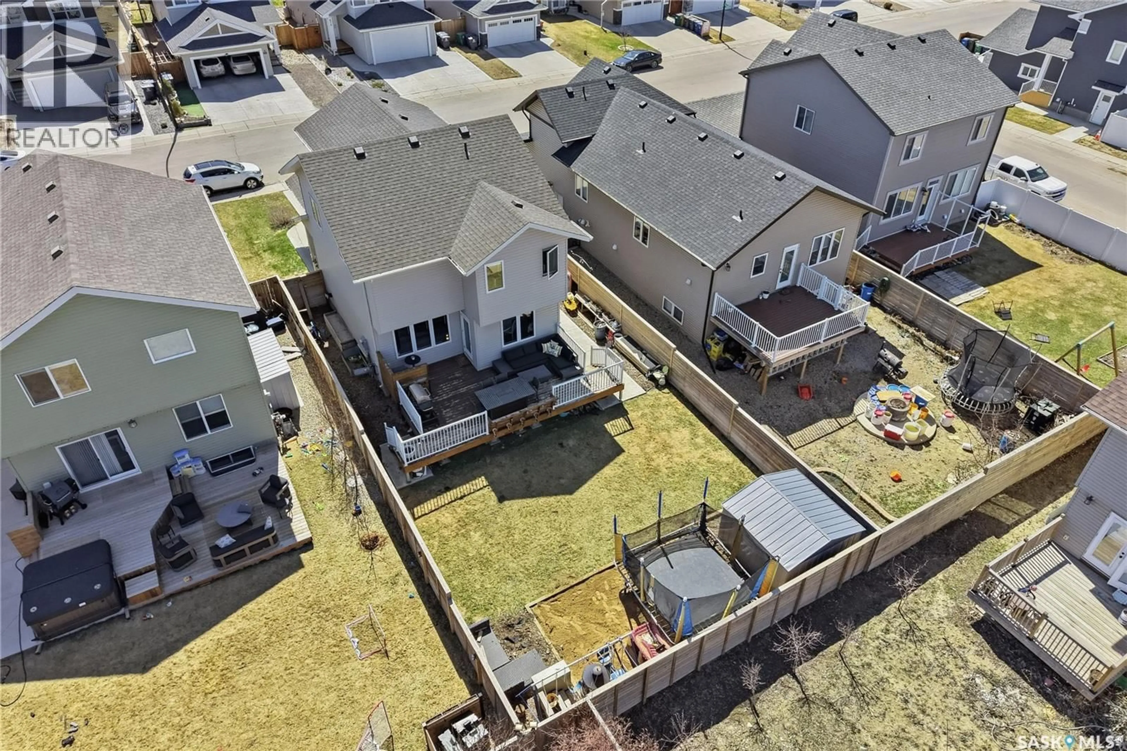 A pic from outside/outdoor area/front of a property/back of a property/a pic from drone, unknown for 810 CHILDERS RISE, Saskatoon Saskatchewan S7L6T9
