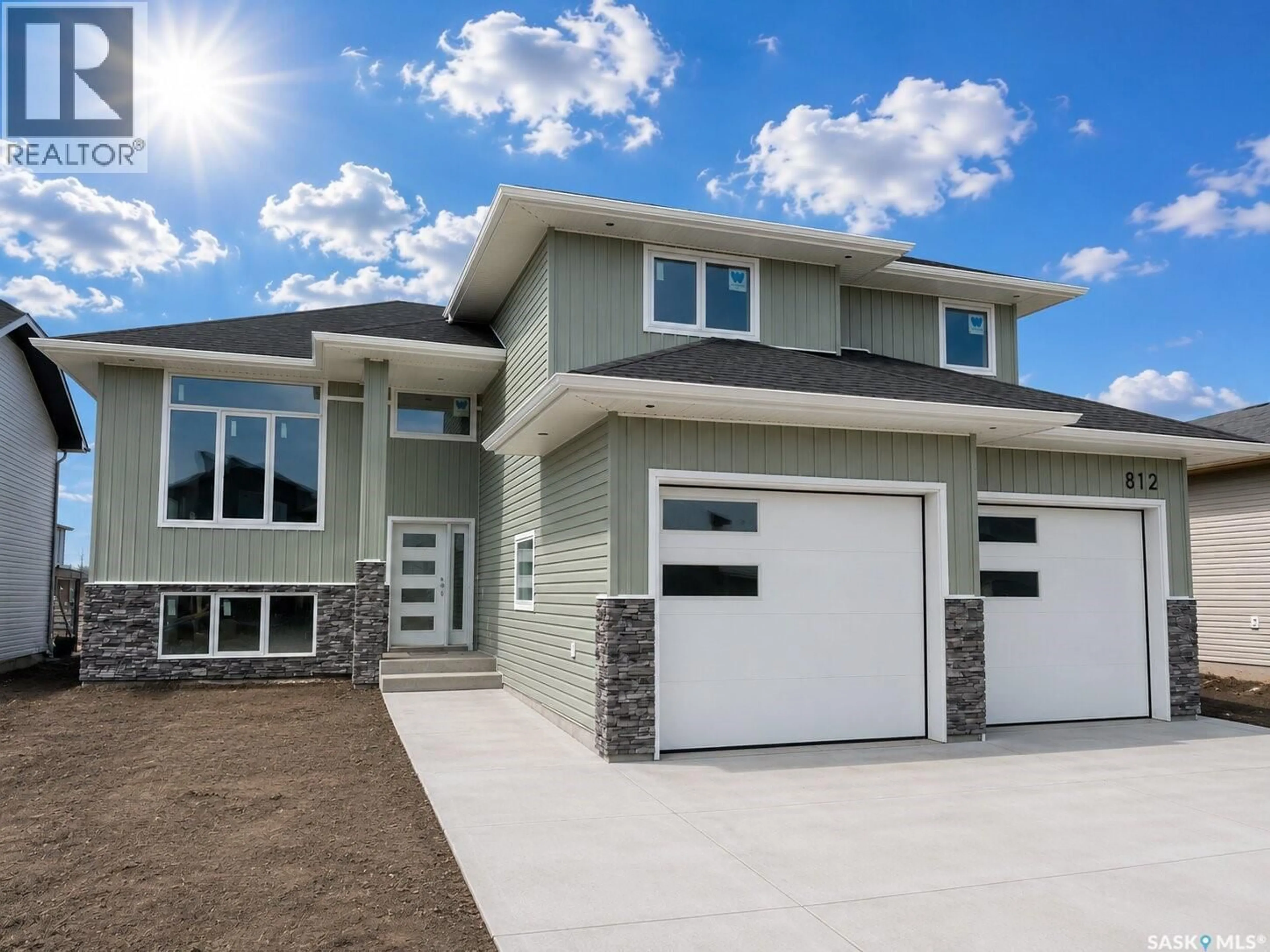 Home with vinyl exterior material, street for 812 BALLESTEROS CRESCENT, Warman Saskatchewan S0K4S4