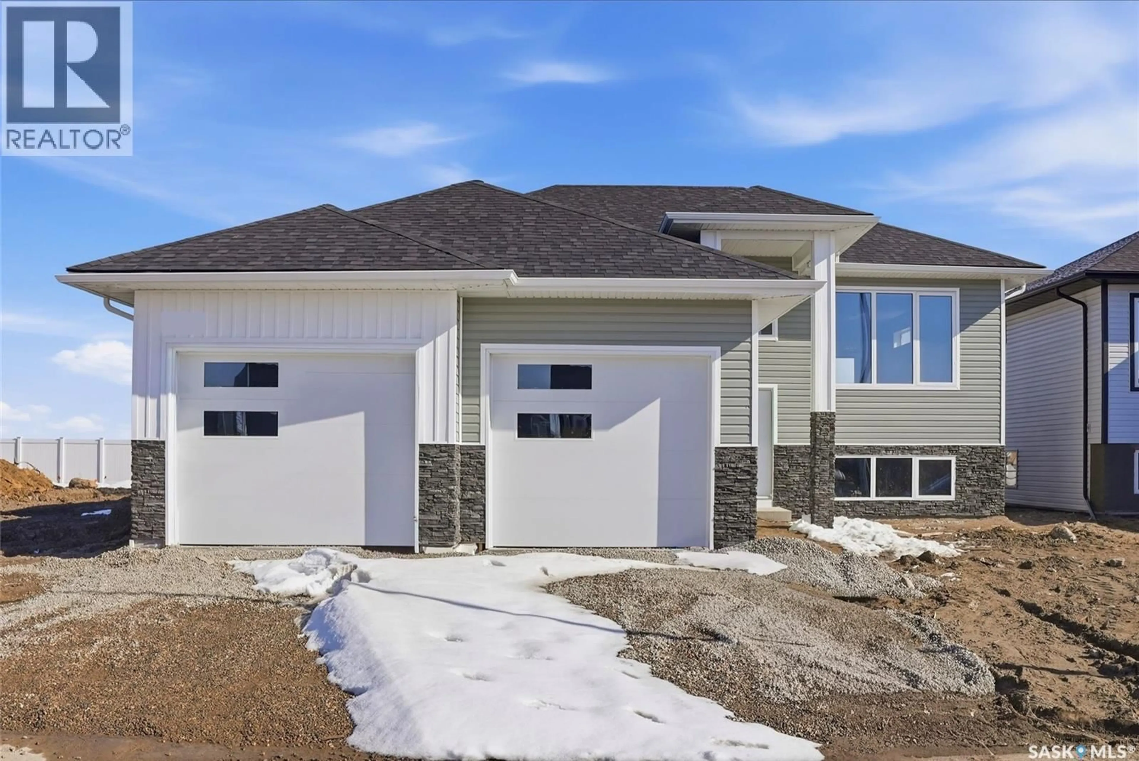Home with vinyl exterior material, street for 816 BALLESTEROS CRESCENT, Warman Saskatchewan S0K4S3