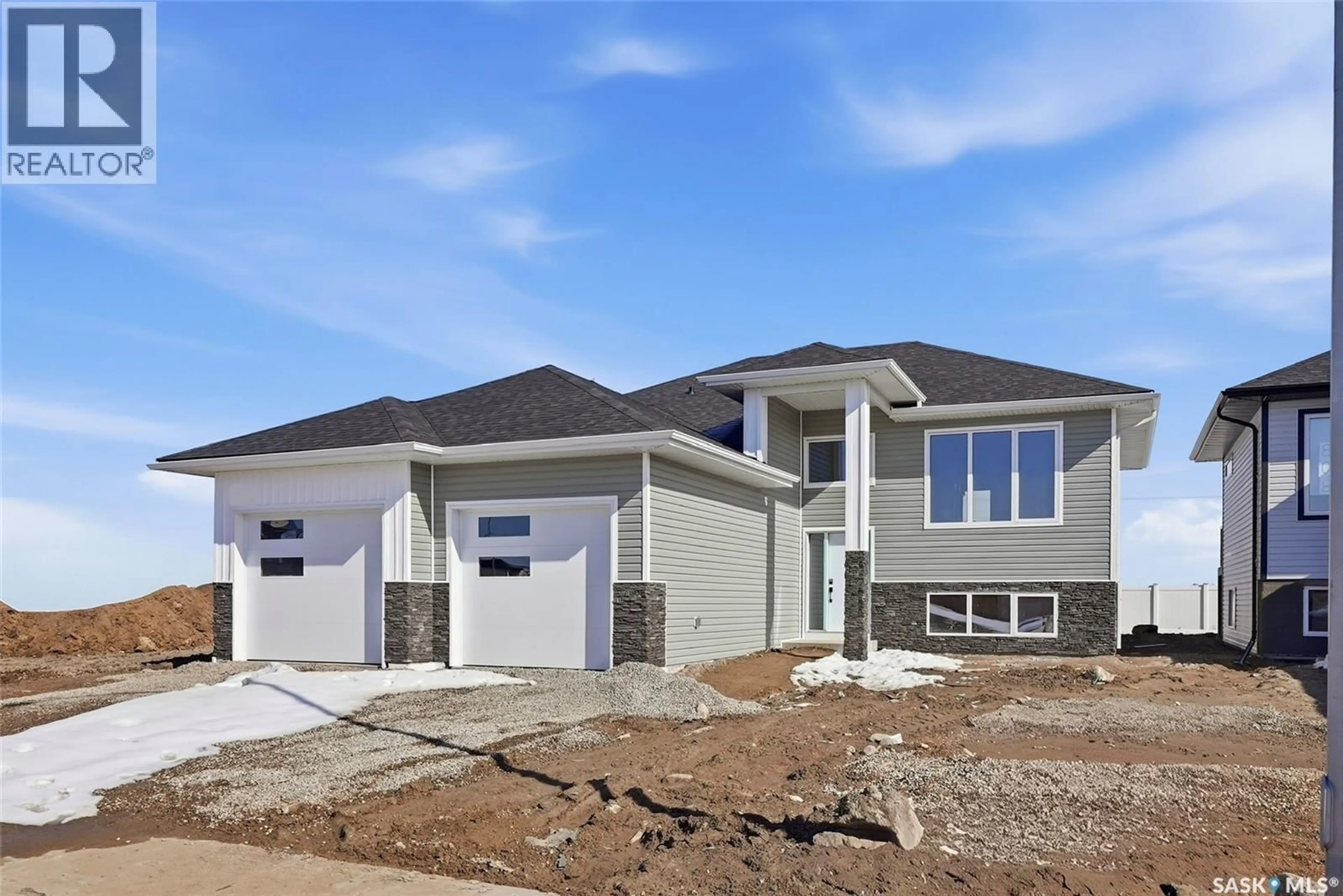 Home with vinyl exterior material, street for 816 BALLESTEROS CRESCENT, Warman Saskatchewan S0K4S3