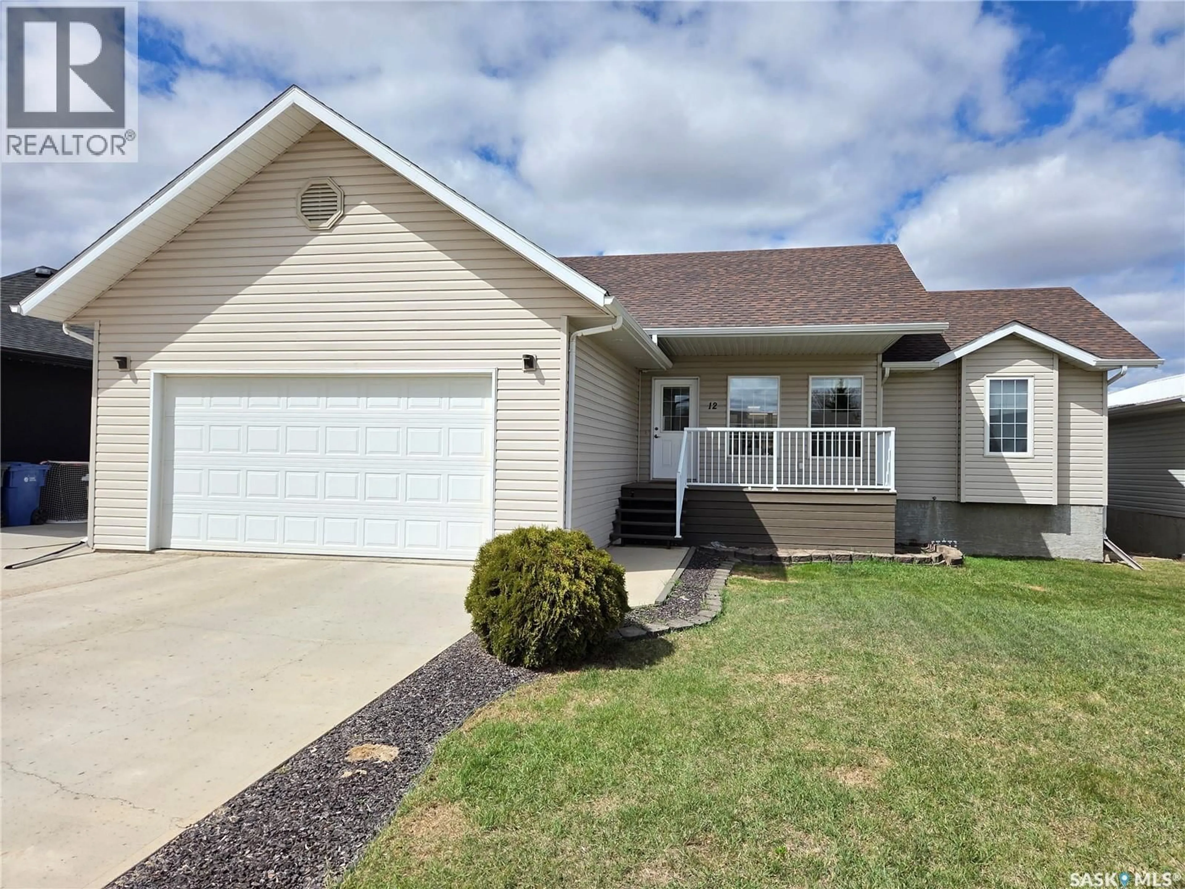 Home with vinyl exterior material, street for 12 ARCOLA PLACE, Carlyle Saskatchewan S0C0R0