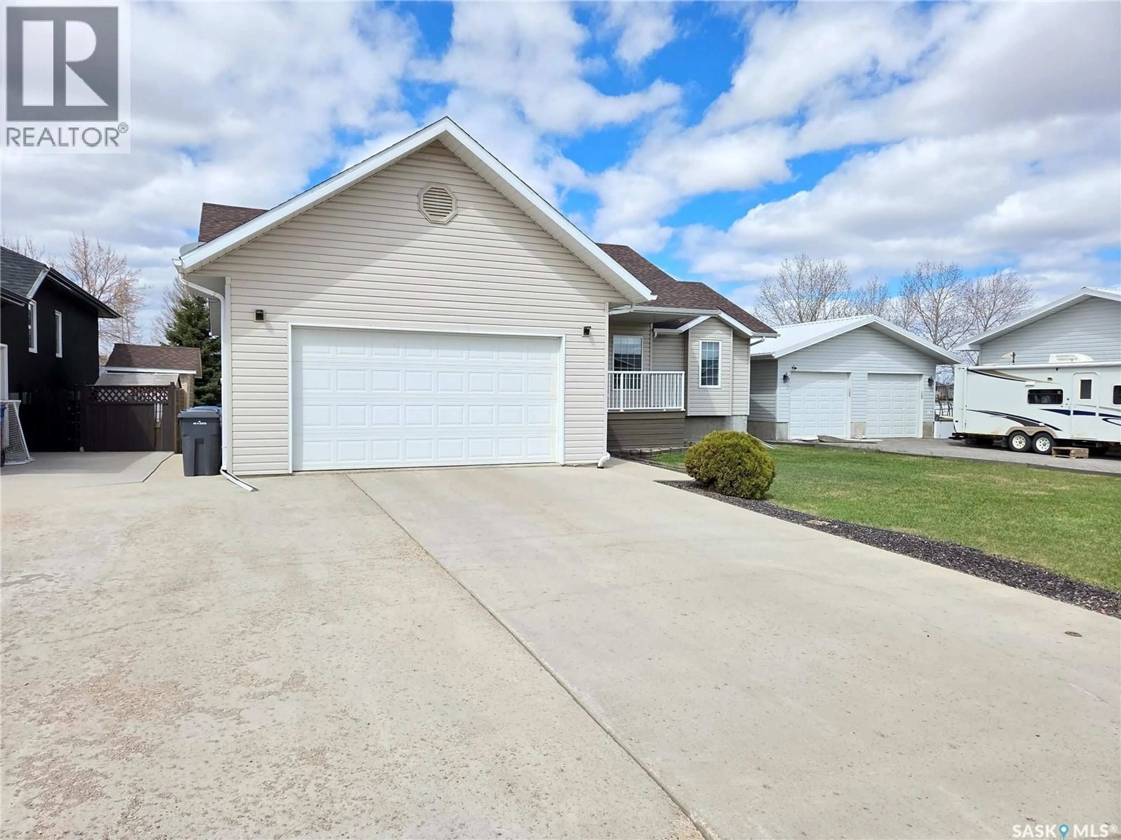 Home with vinyl exterior material, street for 12 ARCOLA PLACE, Carlyle Saskatchewan S0C0R0