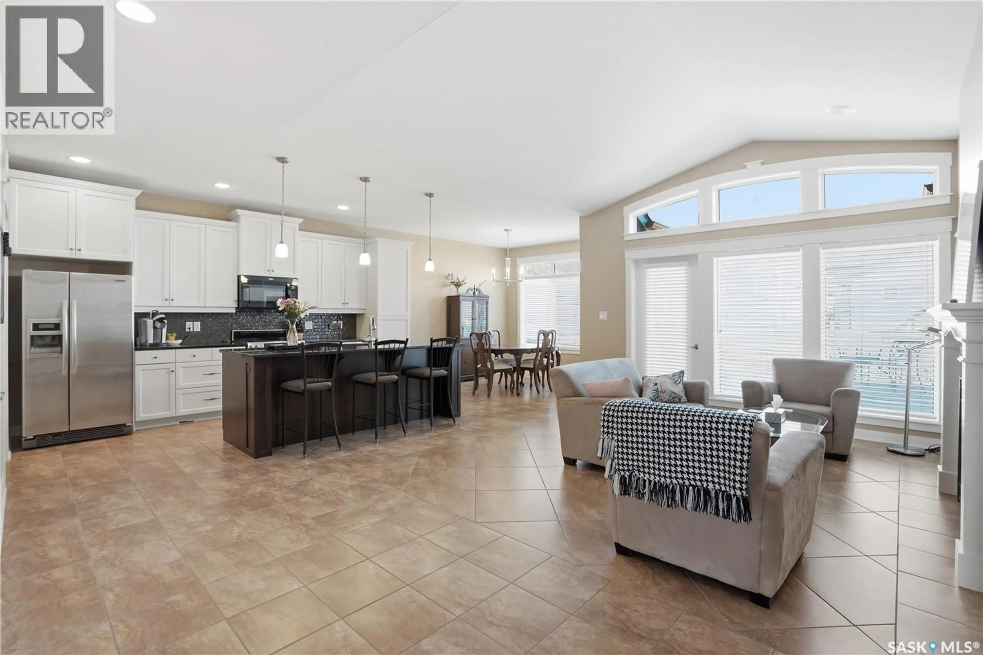 Open concept kitchen, ceramic/tile floor for 211 TRIMBLE LANE, Saskatoon Saskatchewan S7W0C9
