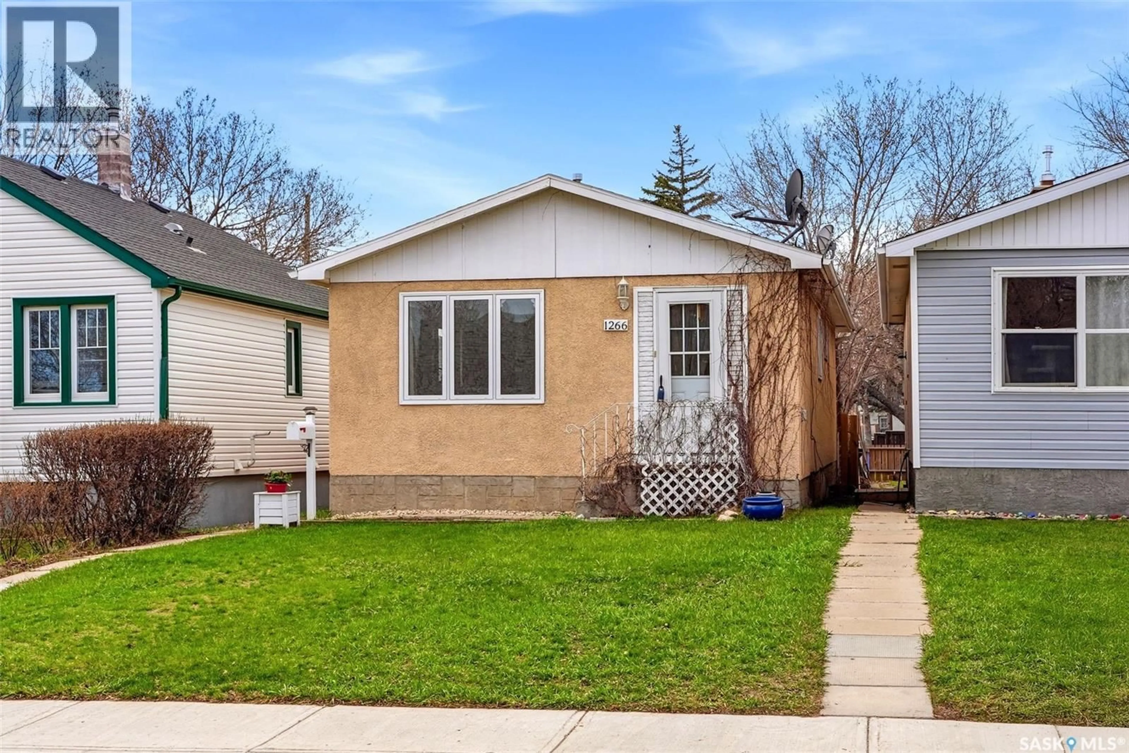 Home with vinyl exterior material, street for 1266 BRODER STREET, Regina Saskatchewan S4N3R2