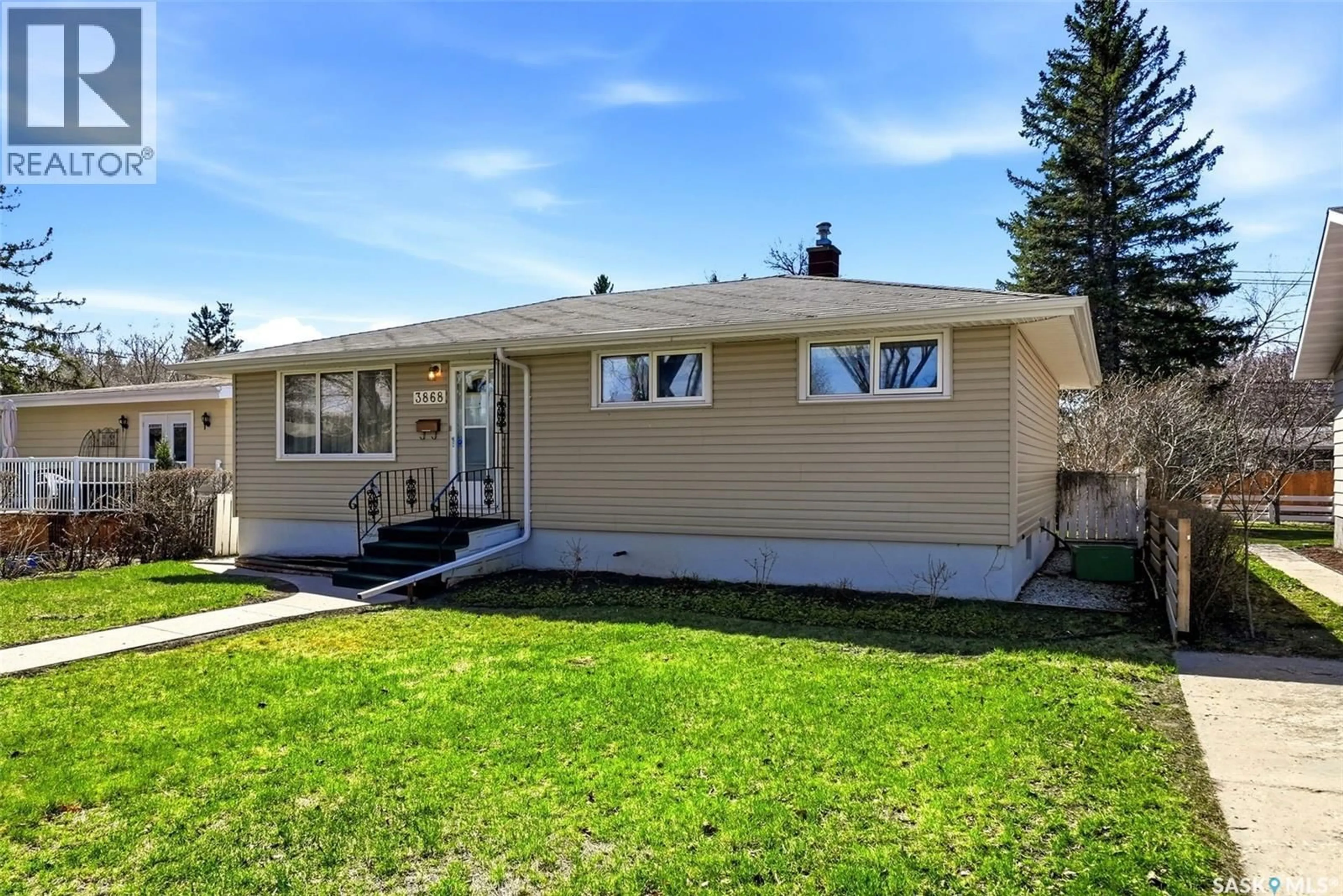 Home with vinyl exterior material, street for 3868 ATHOL STREET, Regina Saskatchewan S4S3J1