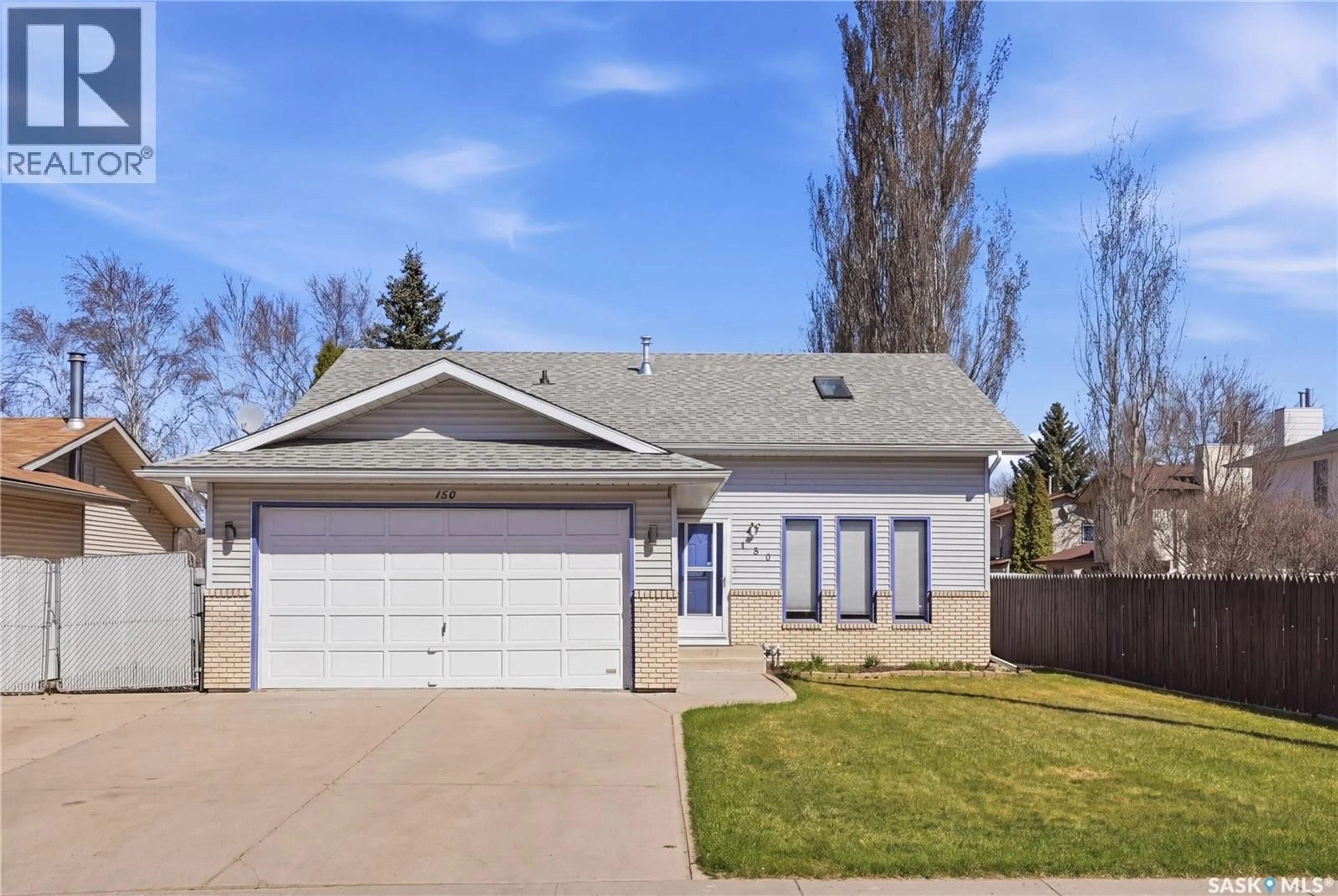 Home with vinyl exterior material, street for 150 ADILMAN DRIVE, Saskatoon Saskatchewan S7K7S3