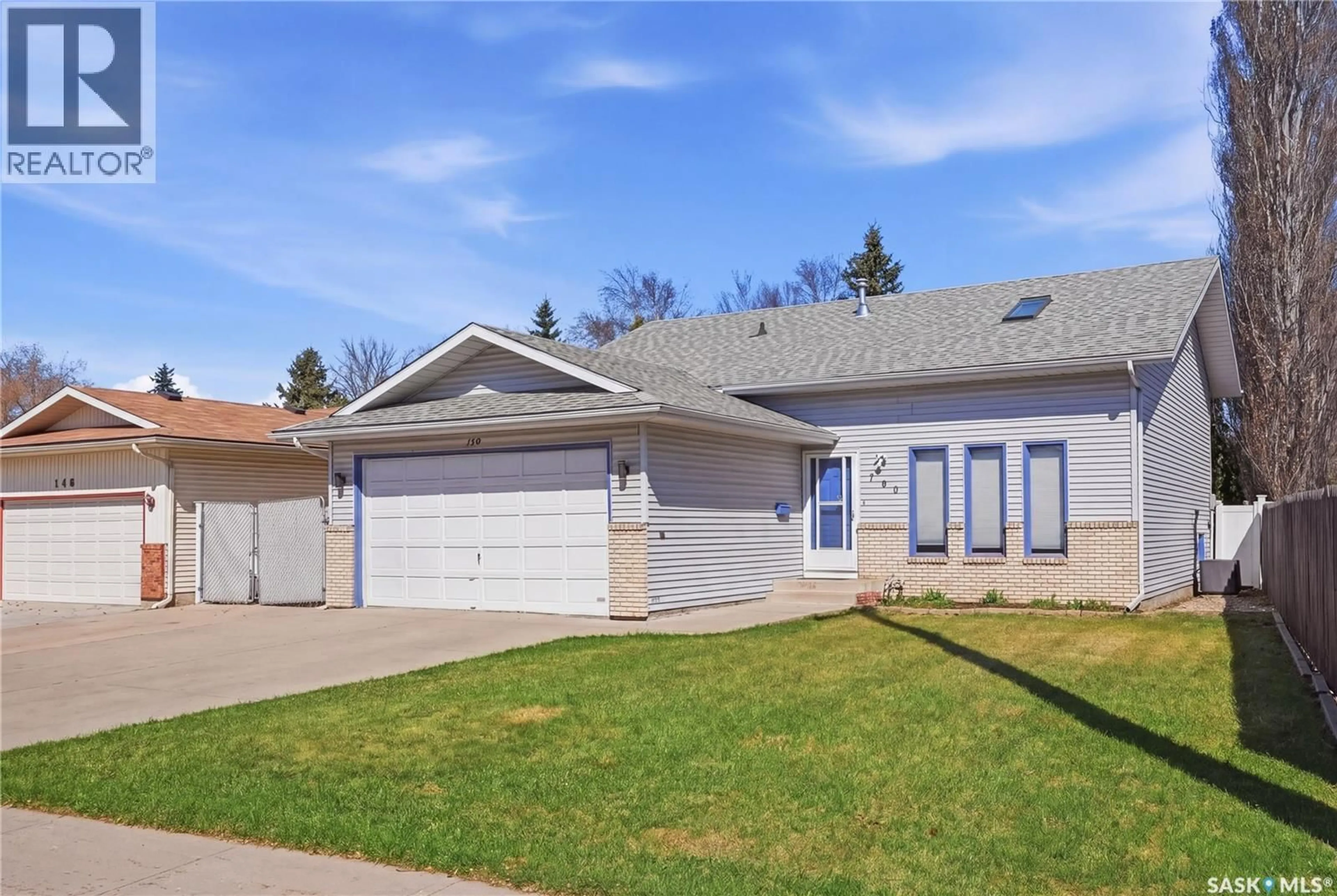 Home with vinyl exterior material, street for 150 ADILMAN DRIVE, Saskatoon Saskatchewan S7K7S3