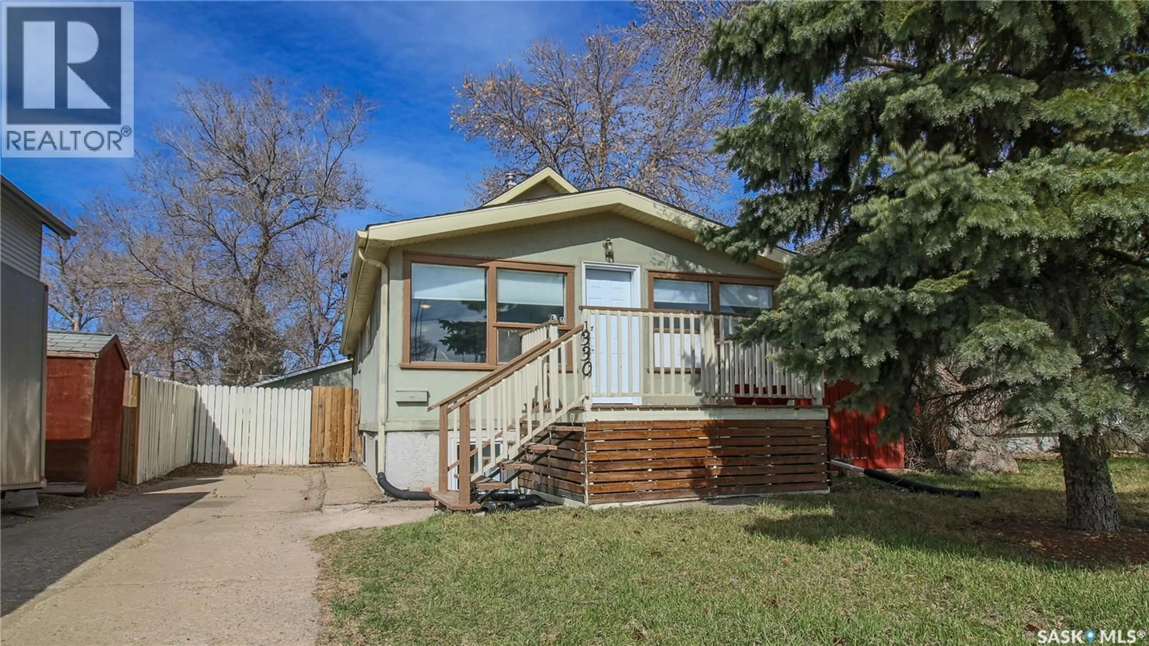 Home with vinyl exterior material, street for 1330 ALEXANDRA STREET, Regina Saskatchewan S4T4N7