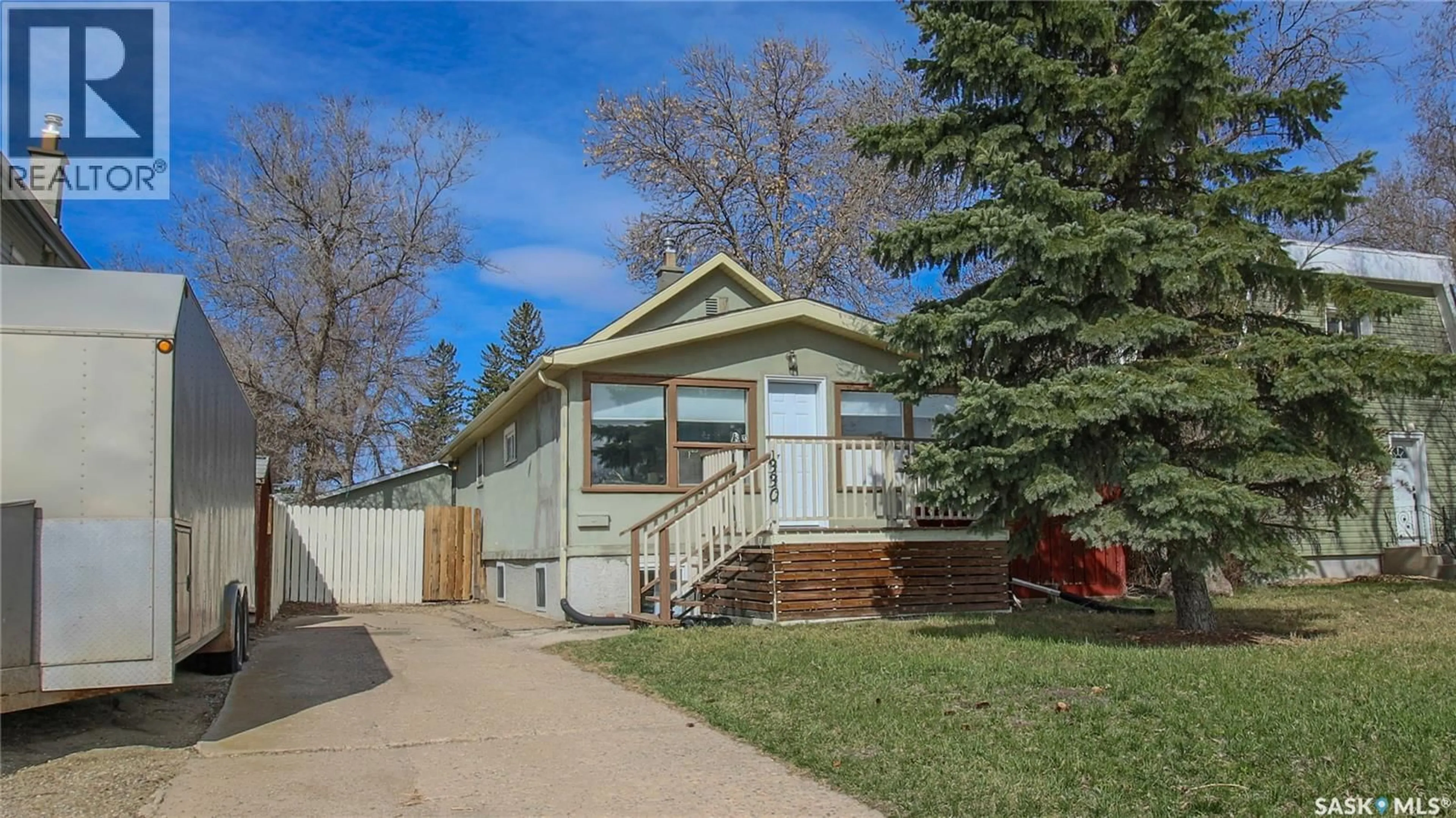 Home with vinyl exterior material, street for 1330 ALEXANDRA STREET, Regina Saskatchewan S4T4N7