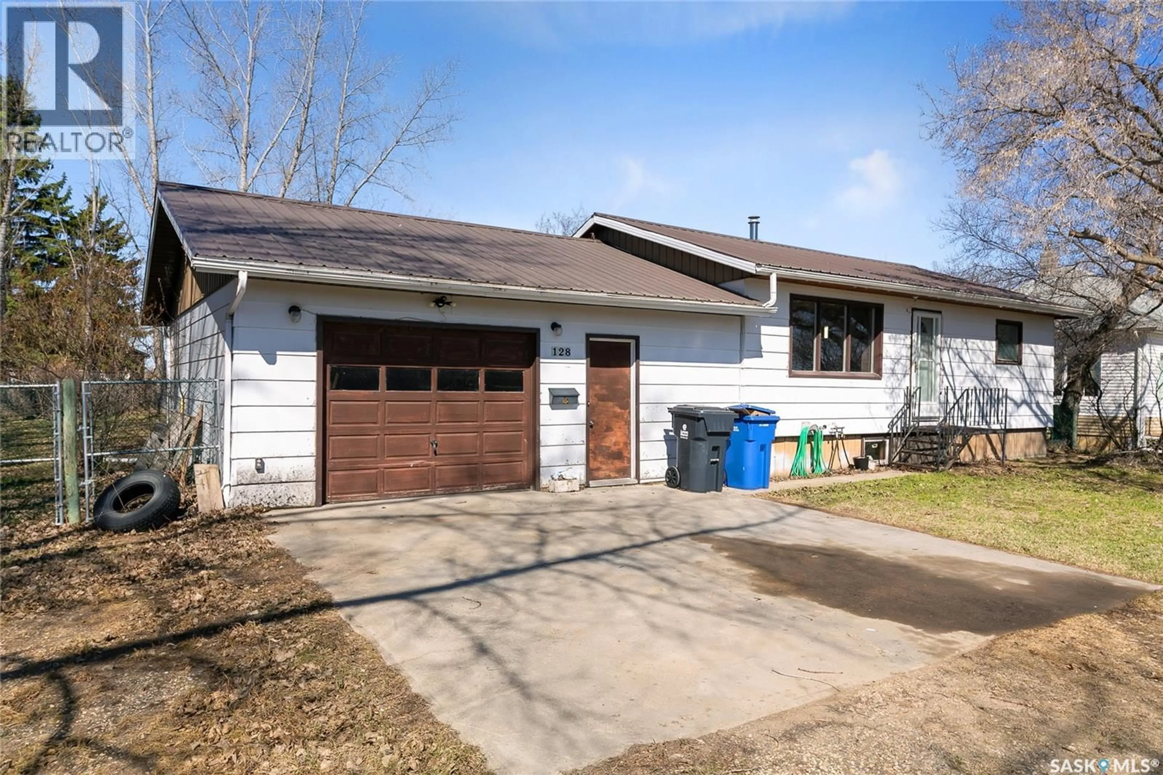 Home with vinyl exterior material, street for 128 PEARSON STREET, Earl Grey Saskatchewan S0G1J0