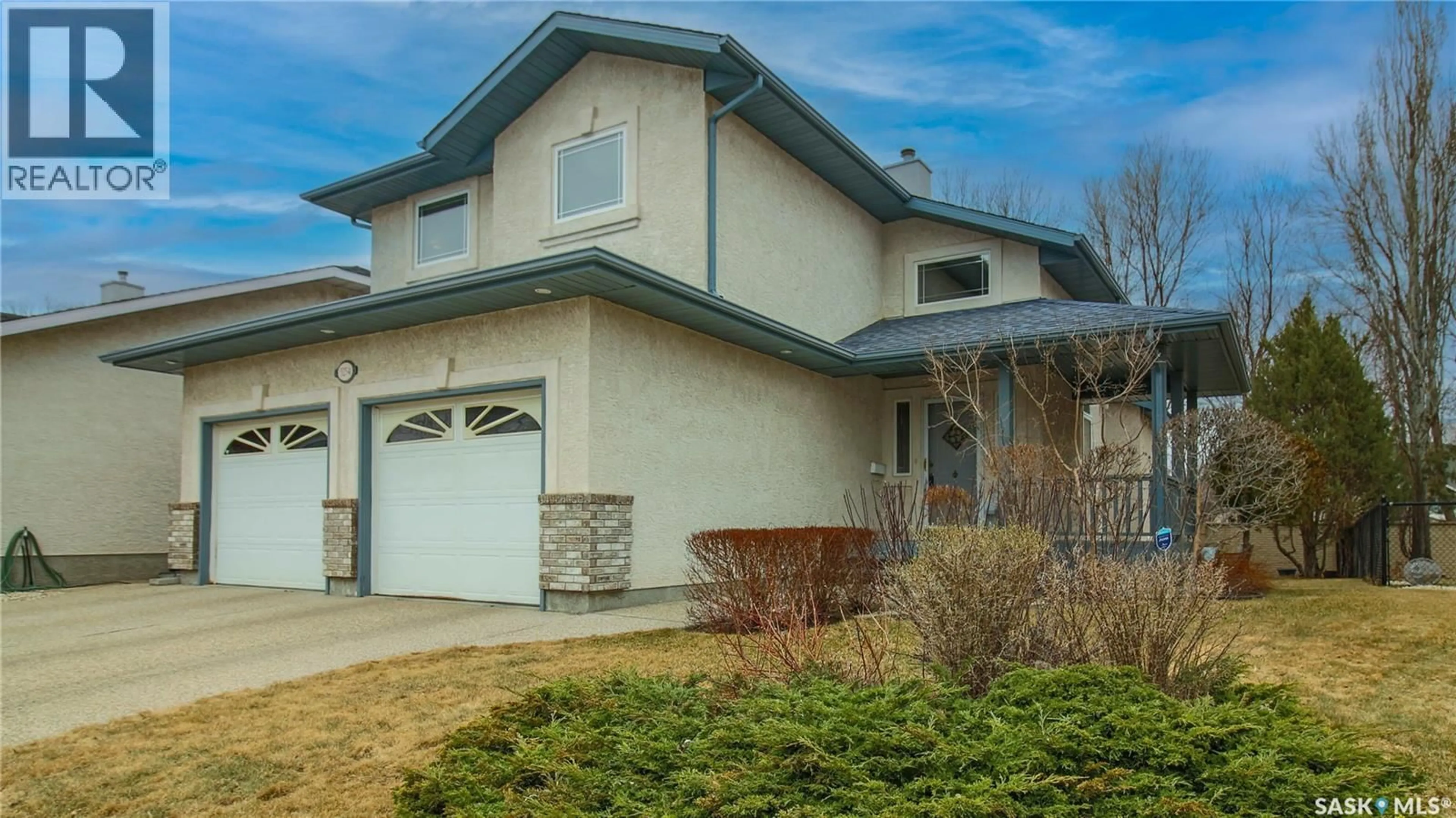 Home with vinyl exterior material, street for E - 3254 PEYSON BAY, Regina Saskatchewan S4V2W8