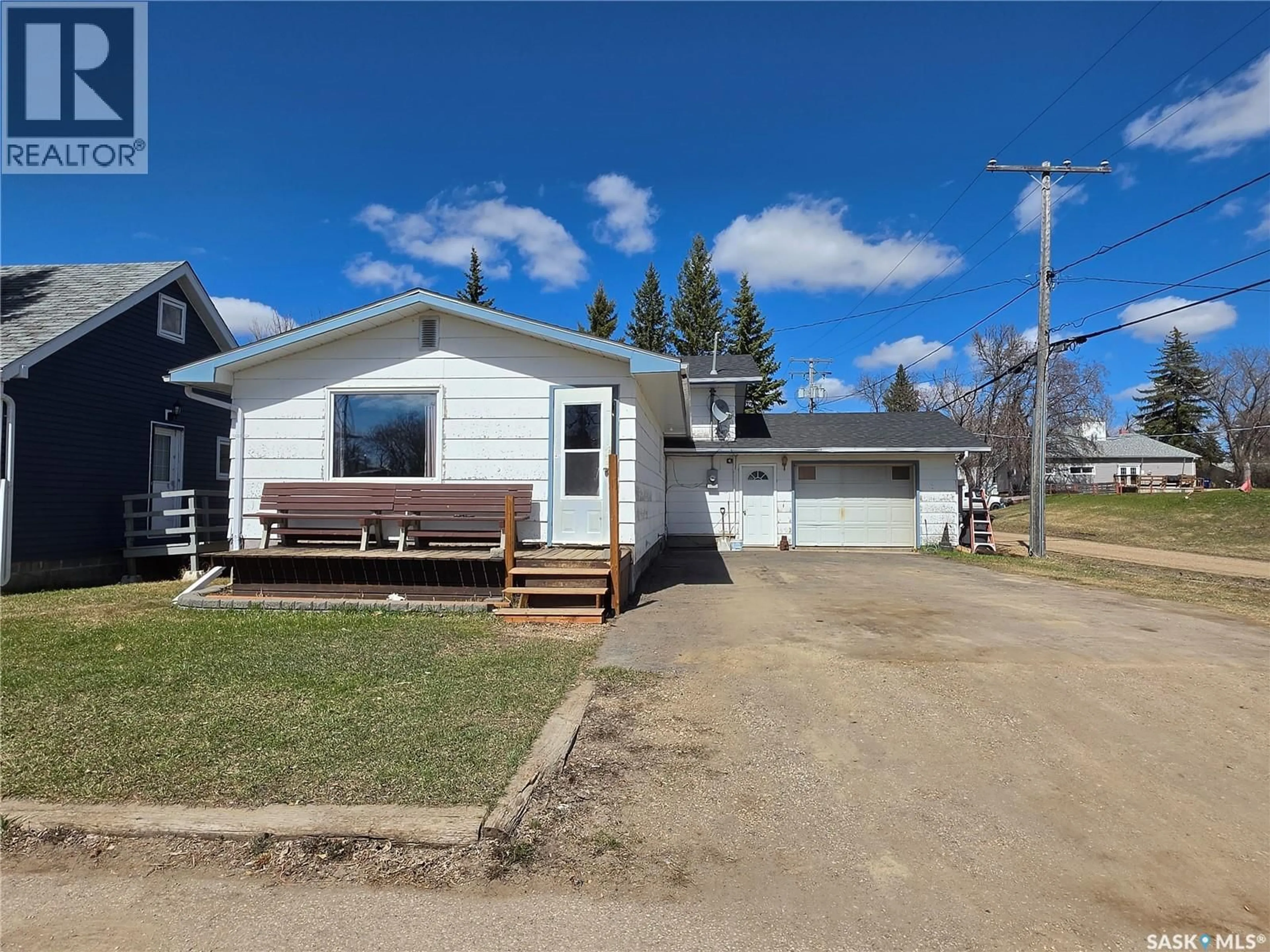 A pic from outside/outdoor area/front of a property/back of a property/a pic from drone, street for 725 2ND AVENUE, Raymore Saskatchewan S0A3J0