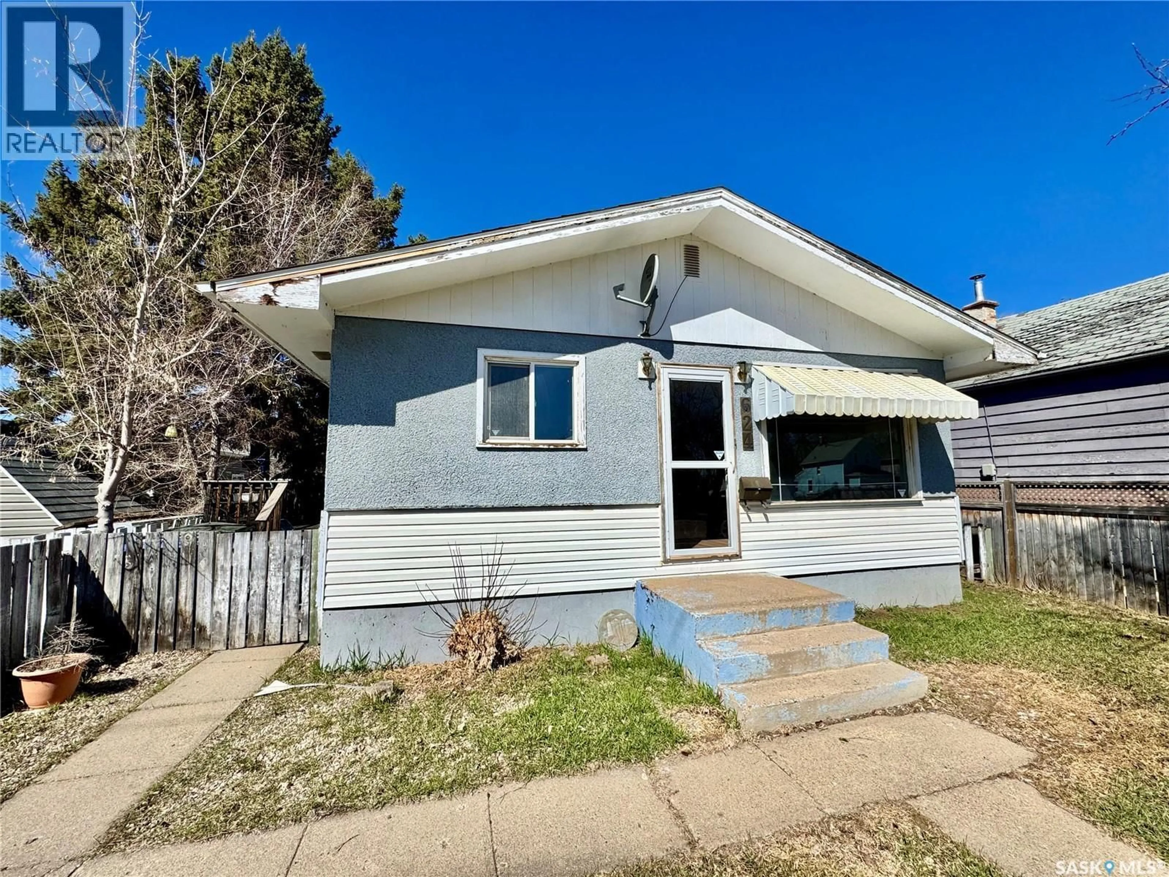 Home with vinyl exterior material, street for 624 7TH STREET, Prince Albert Saskatchewan S6V0S8