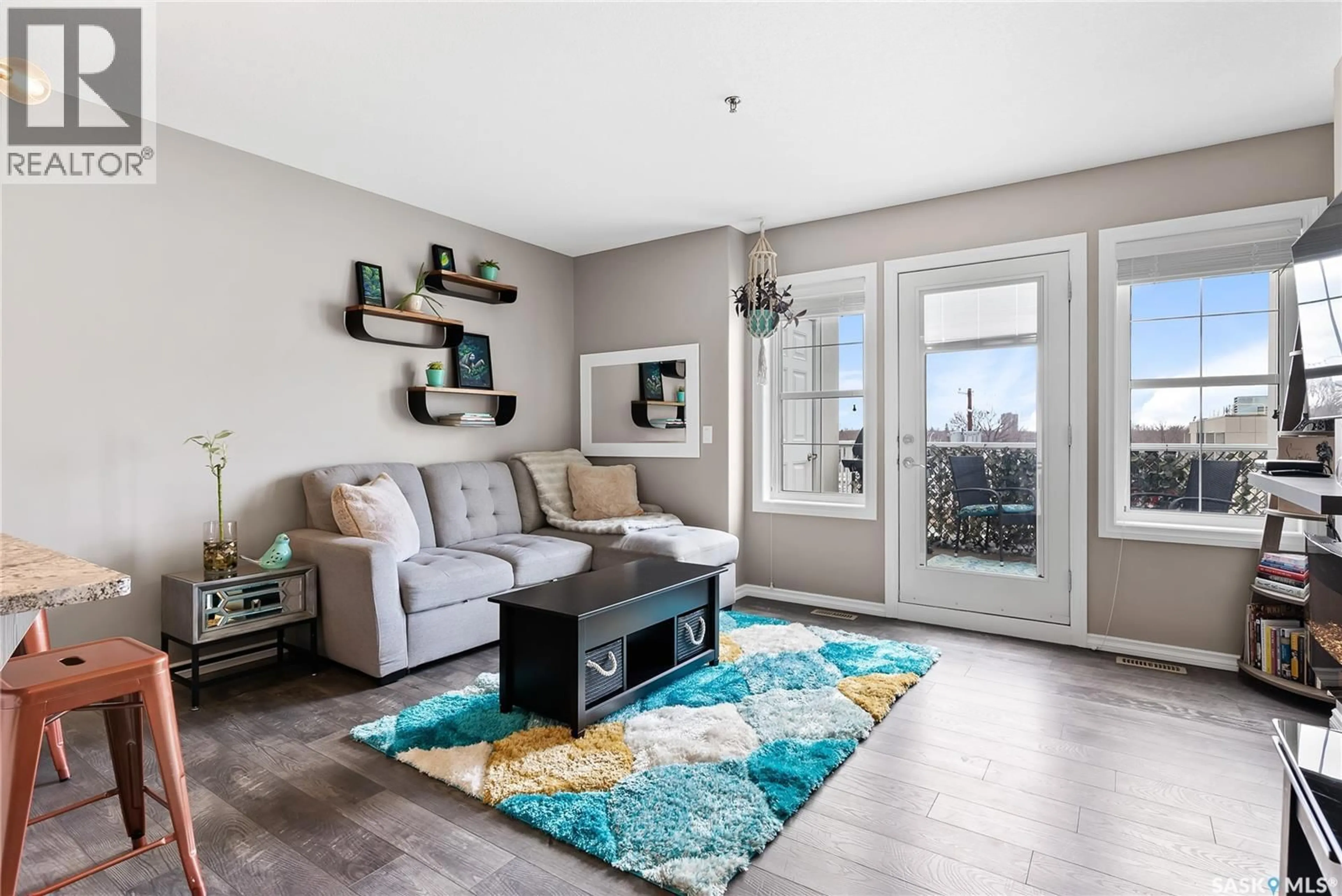 Living room with furniture, unknown for 311 1715 BADHAM BOULEVARD, Regina Saskatchewan S4P0L9