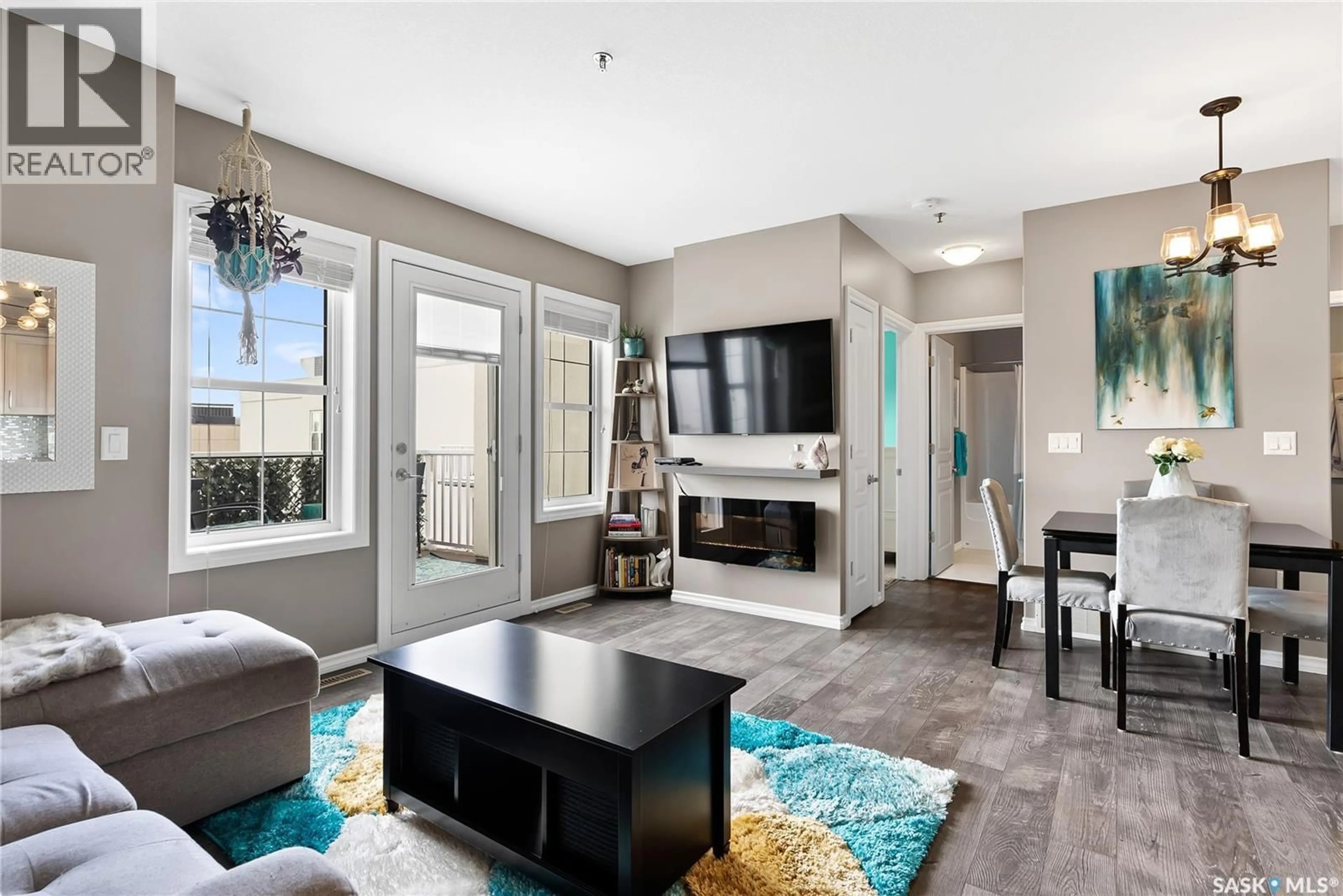 Living room with furniture, unknown for 311 1715 BADHAM BOULEVARD, Regina Saskatchewan S4P0L9