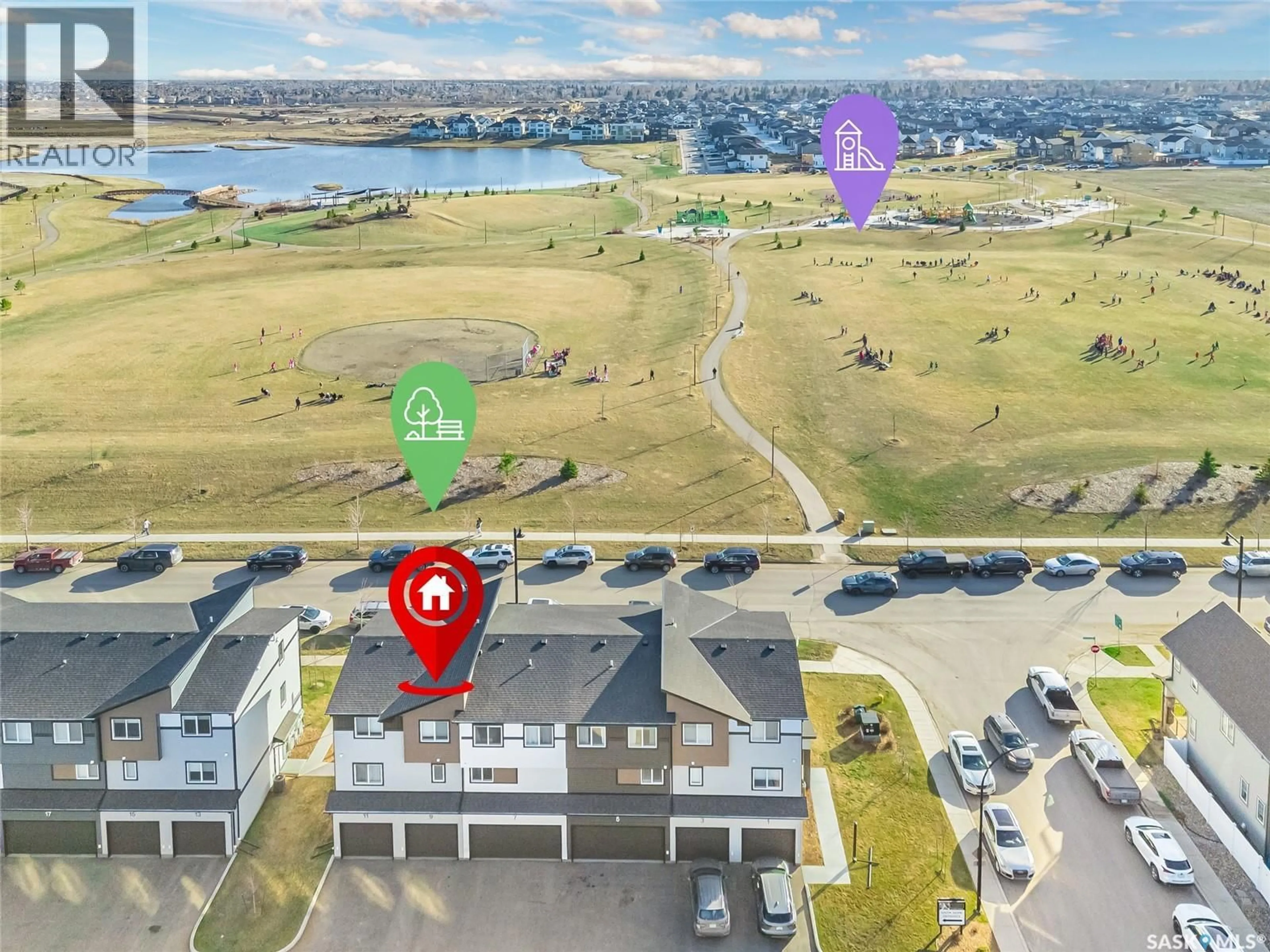 A pic from outside/outdoor area/front of a property/back of a property/a pic from drone, water/lake/river/ocean view for 9 651 DUBOIS CRESCENT, Saskatoon Saskatchewan S7V0R3
