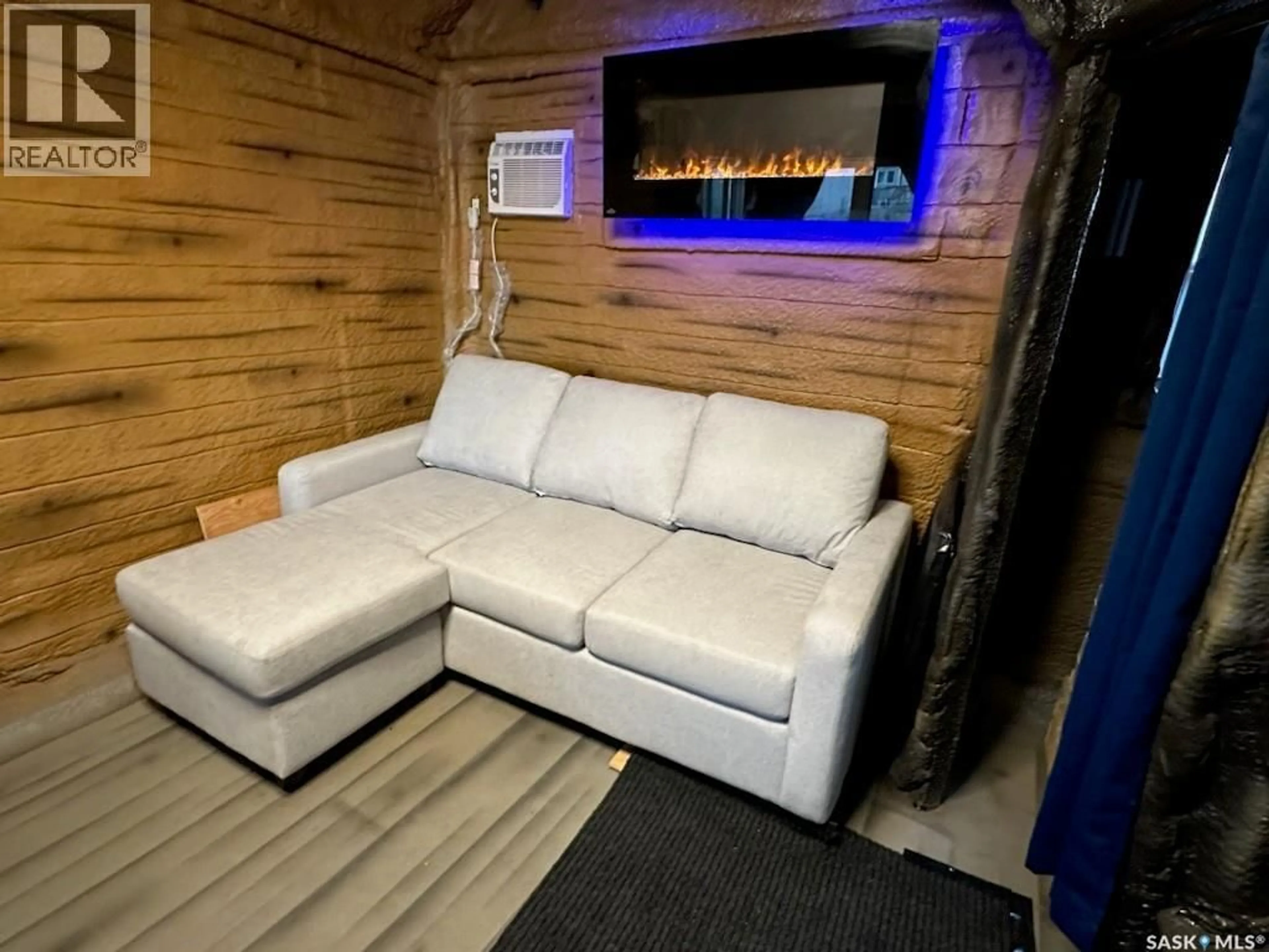 Living room with furniture, unknown for HIDDEN PATH ACREAGE, Fish Creek Rm No. 402 Saskatchewan S0K3R0