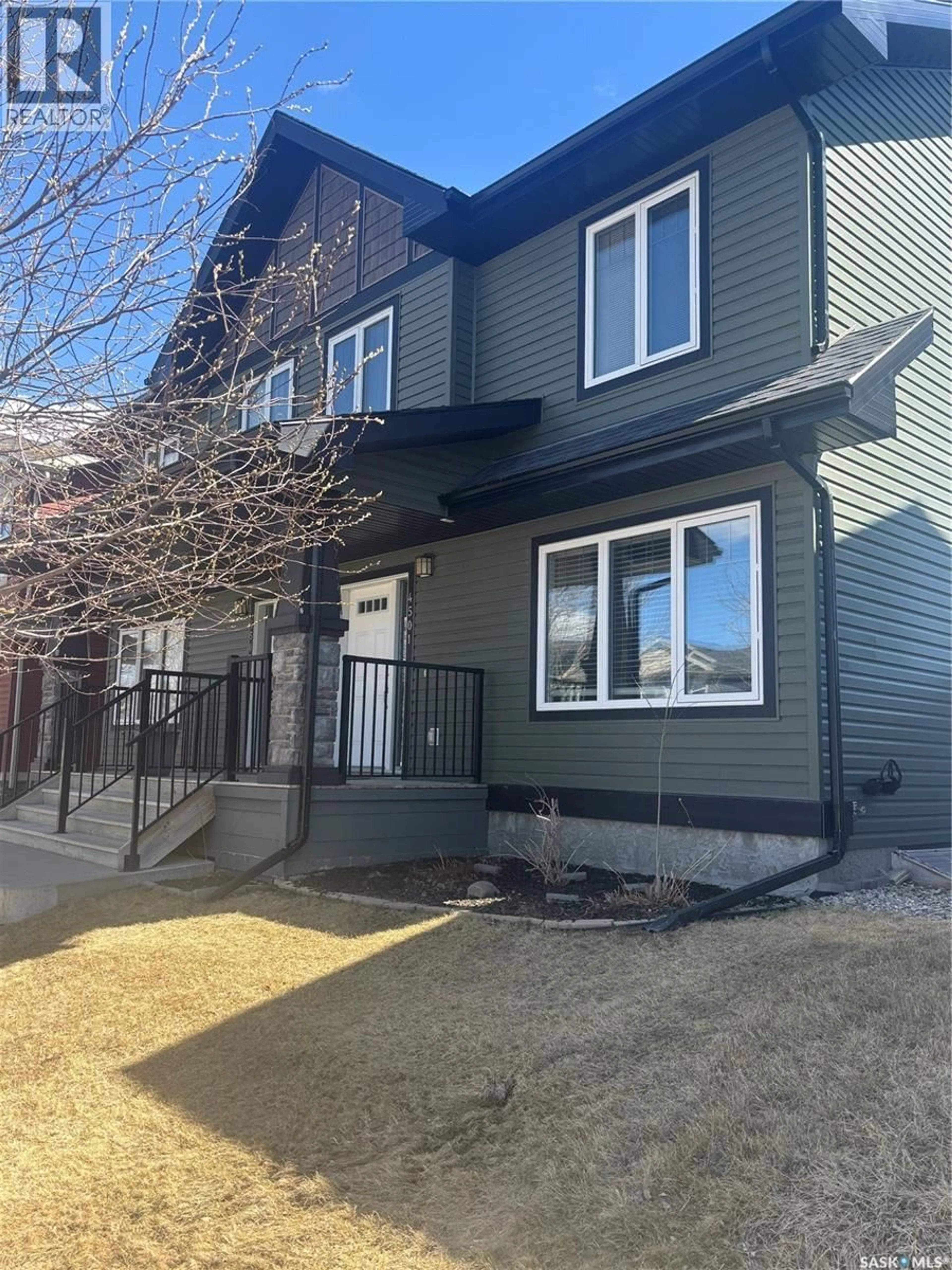 Home with vinyl exterior material, street for E - 4501 GREEN POPLAR LANE, Regina Saskatchewan S4V3A5