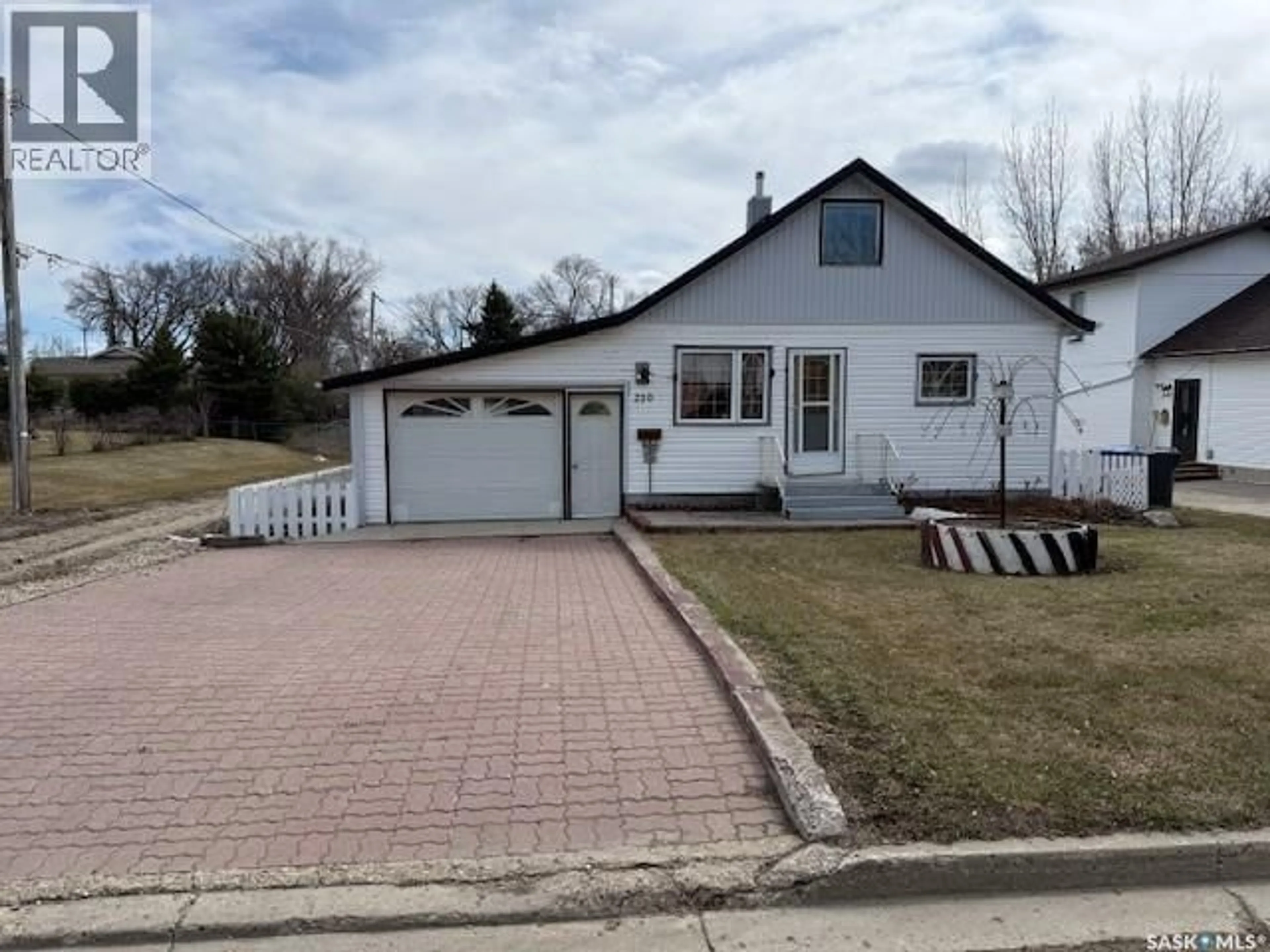 A pic from outside/outdoor area/front of a property/back of a property/a pic from drone, street for 230 NICHOLAS STREET, Kamsack Saskatchewan S0A1S0