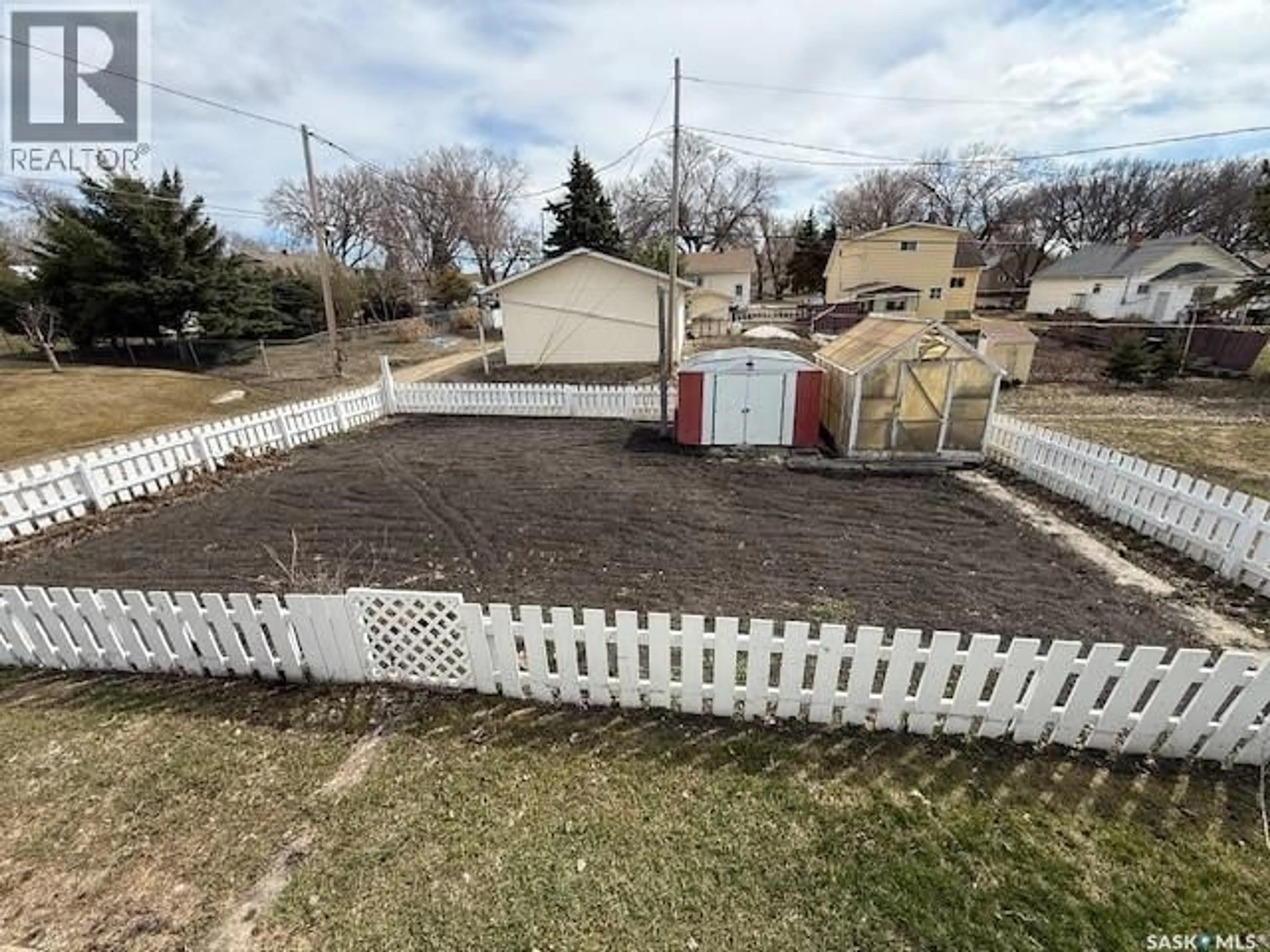 A pic from outside/outdoor area/front of a property/back of a property/a pic from drone, street for 230 NICHOLAS STREET, Kamsack Saskatchewan S0A1S0
