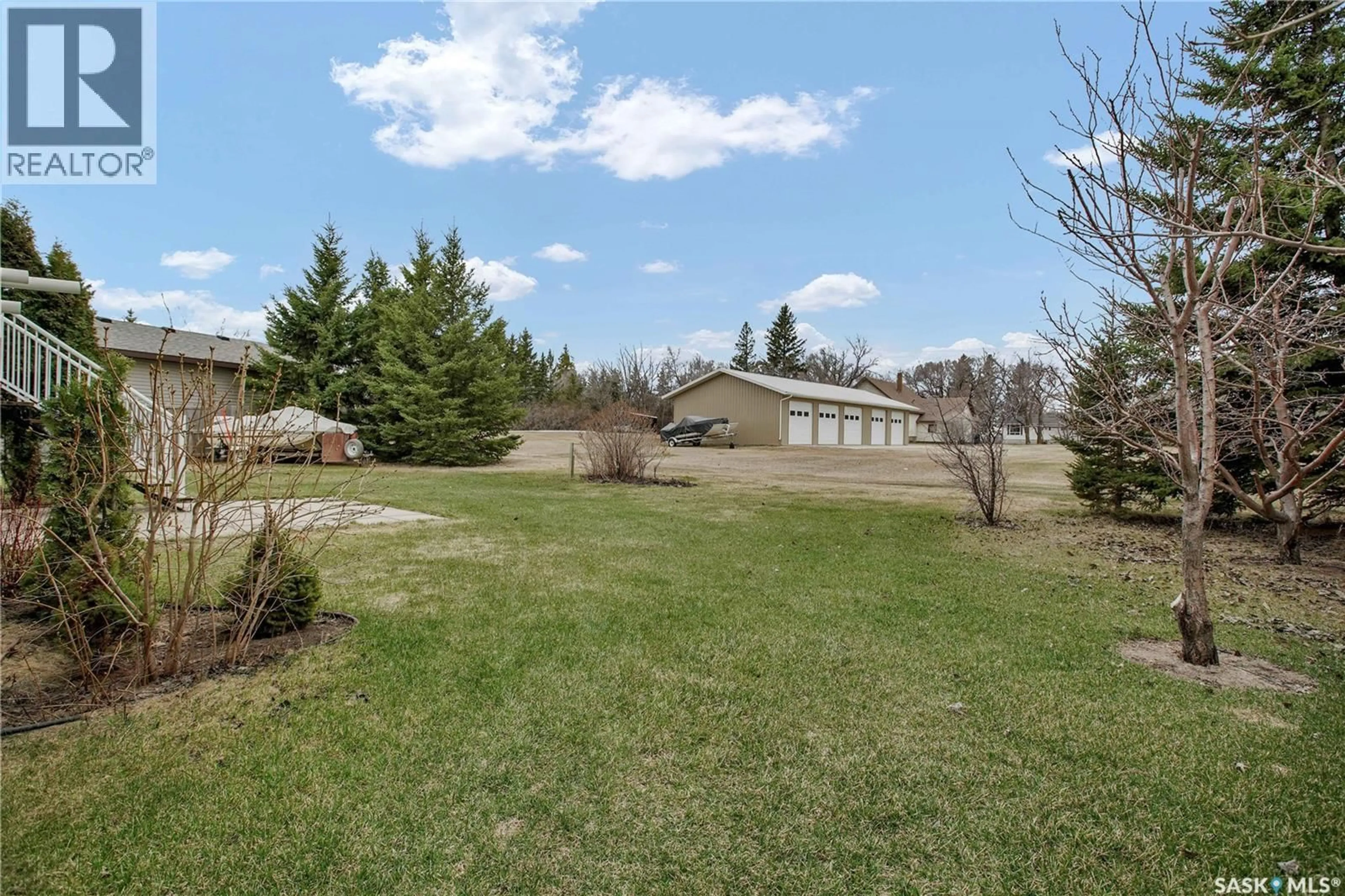 A pic from outside/outdoor area/front of a property/back of a property/a pic from drone, unknown for 214 CEDAR PLACE, Waldheim Saskatchewan S0K4R0
