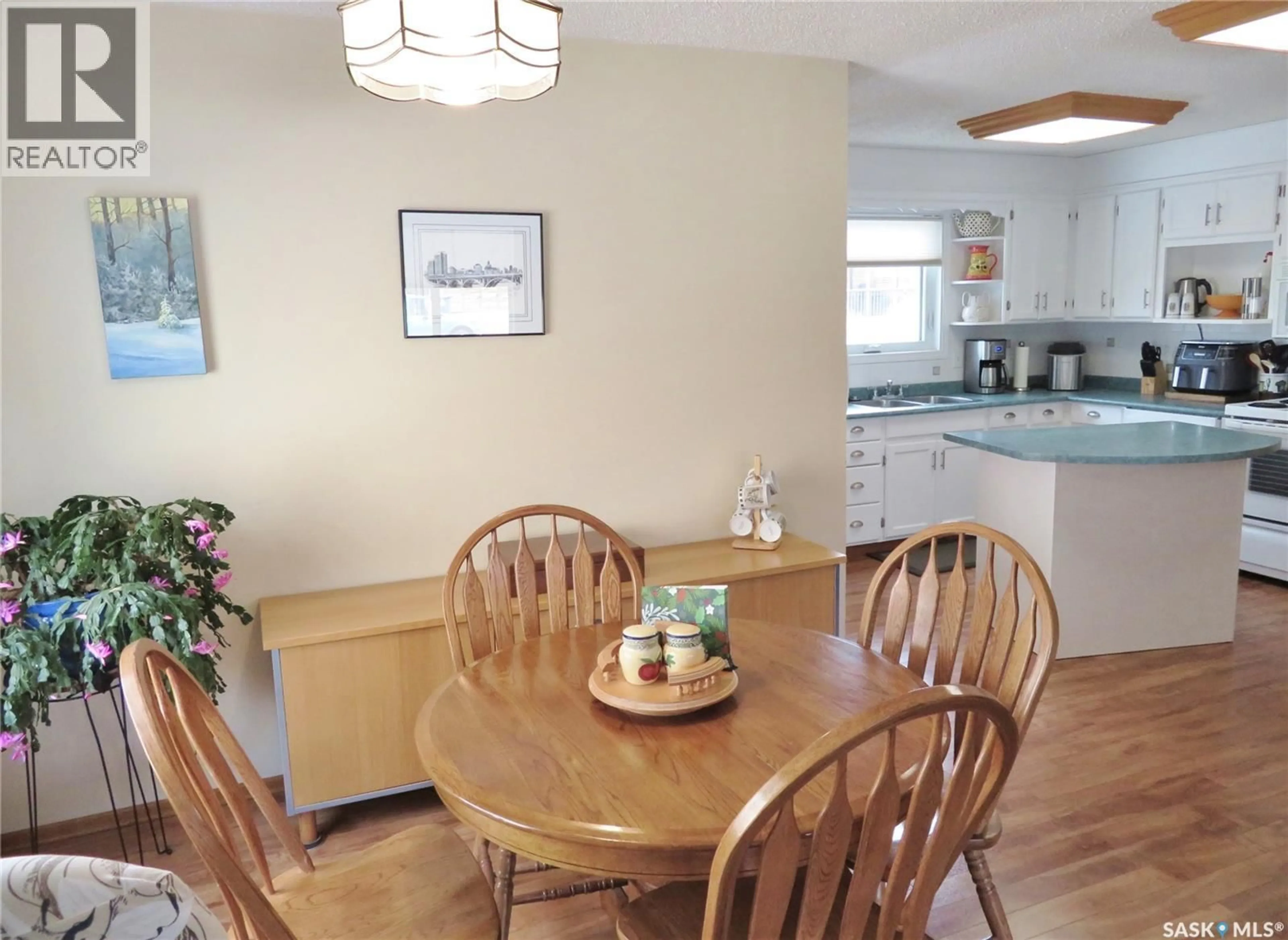 Dining room, wood/laminate floor for 315 BENESH CRESCENT, Saskatoon Saskatchewan S7K6P1