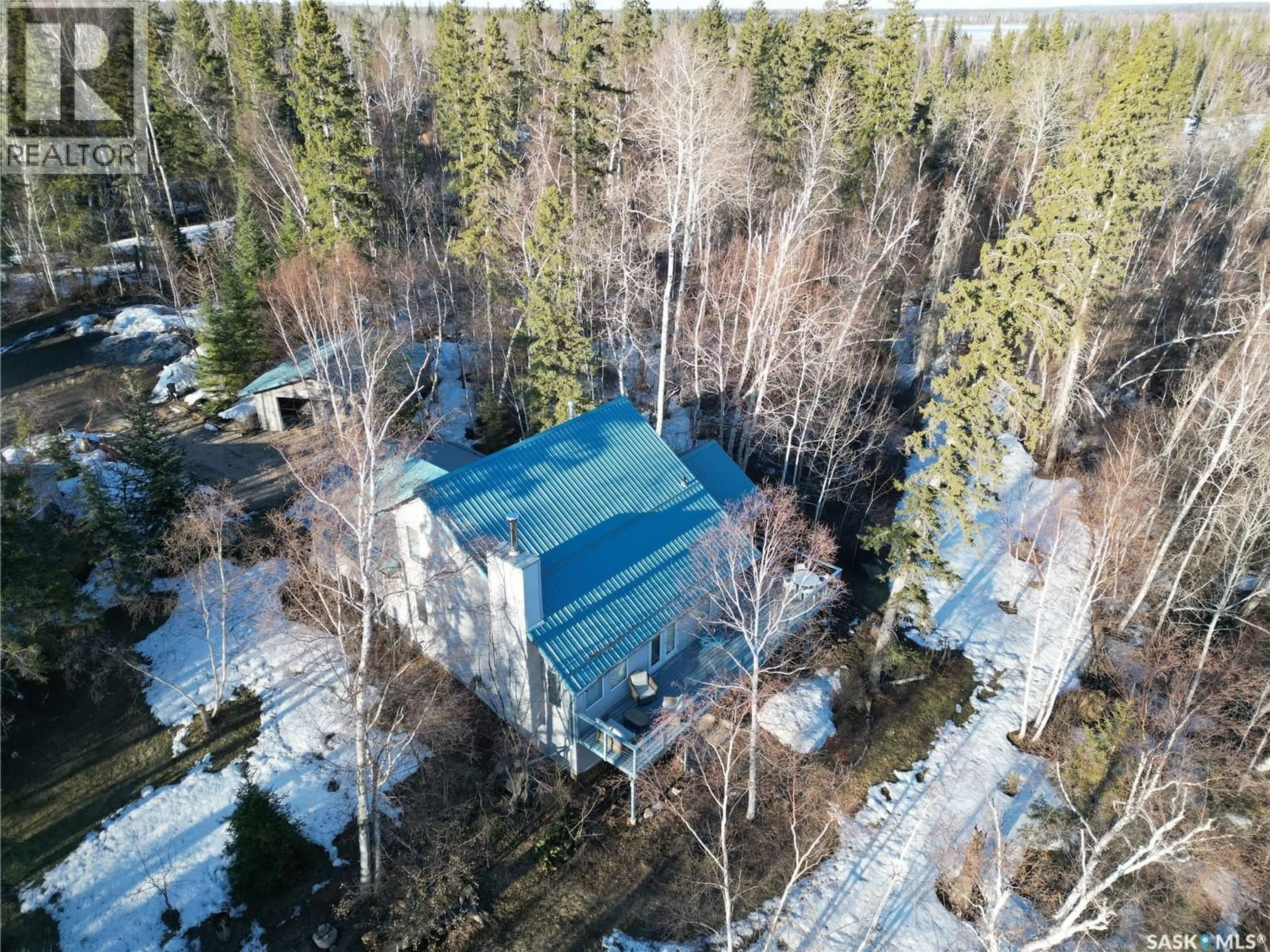 A pic from outside/outdoor area/front of a property/back of a property/a pic from drone, forest/trees view for 101 DONNA PLACE, Lakeland Rm No. 521 Saskatchewan S0J0N0
