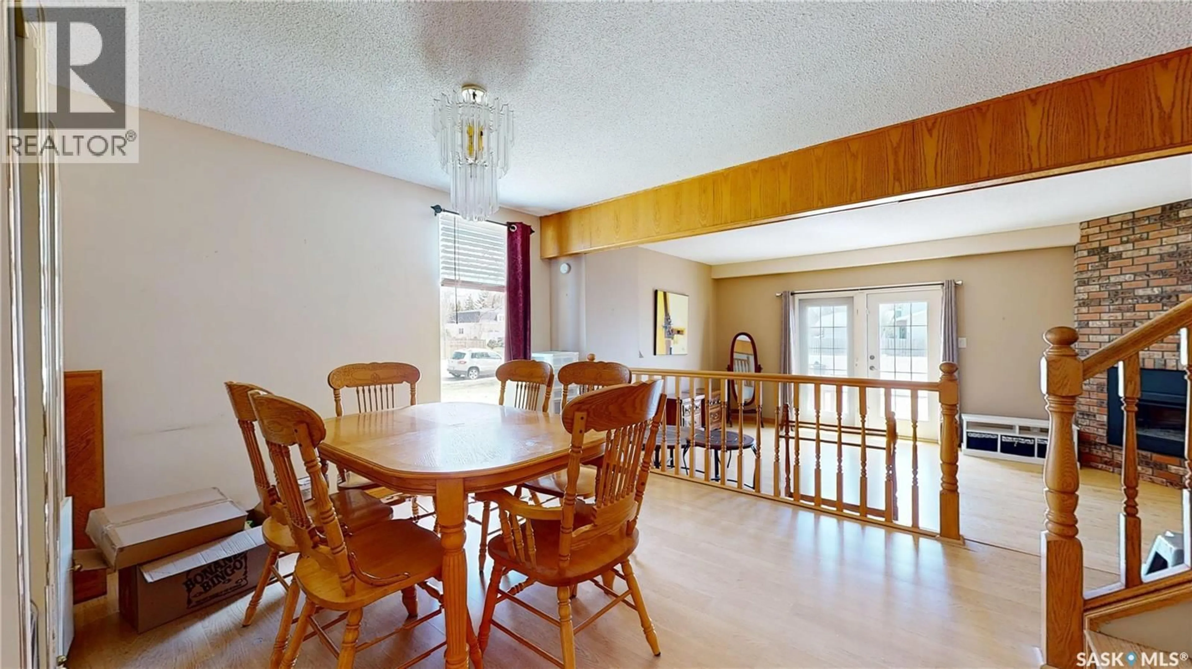 Dining room, wood/laminate floor for 4766 QUEEN STREET, Regina Saskatchewan S4S6G7