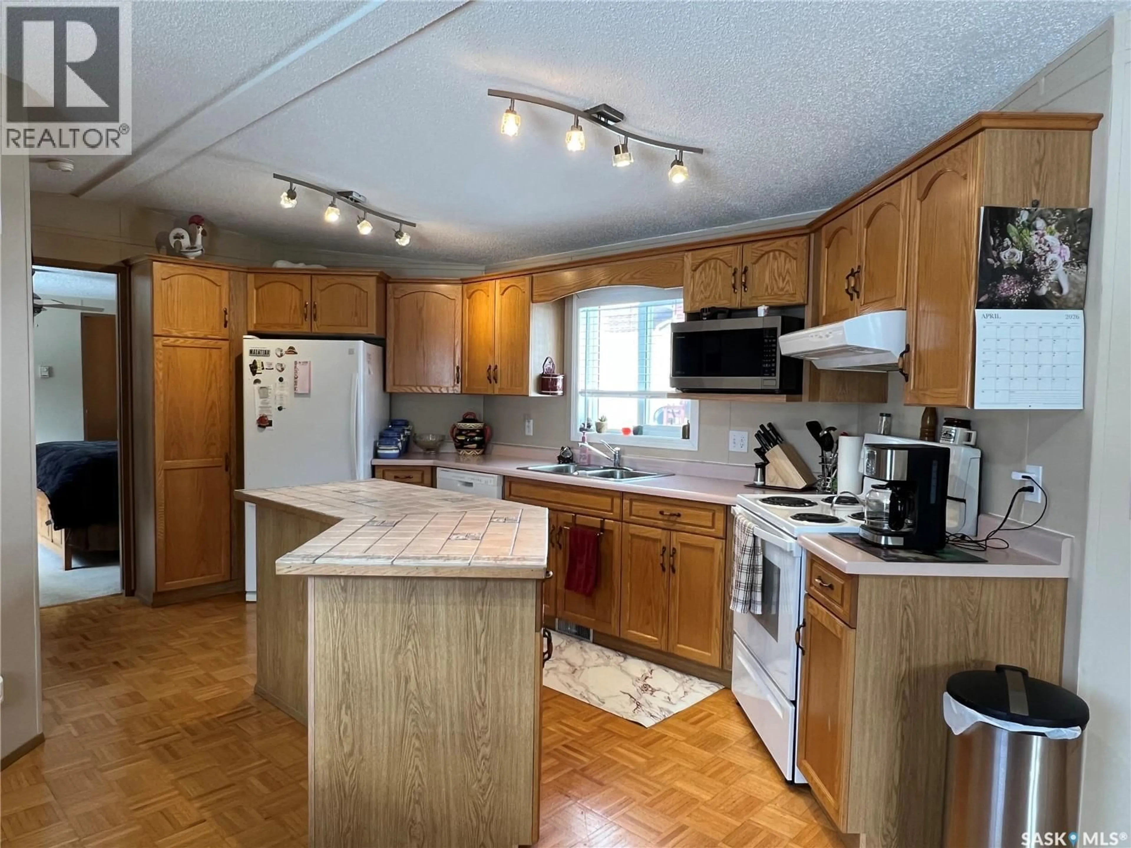 Standard kitchen, wood/laminate floor for 513 3RD STREET, Goodsoil Saskatchewan S0M1A0