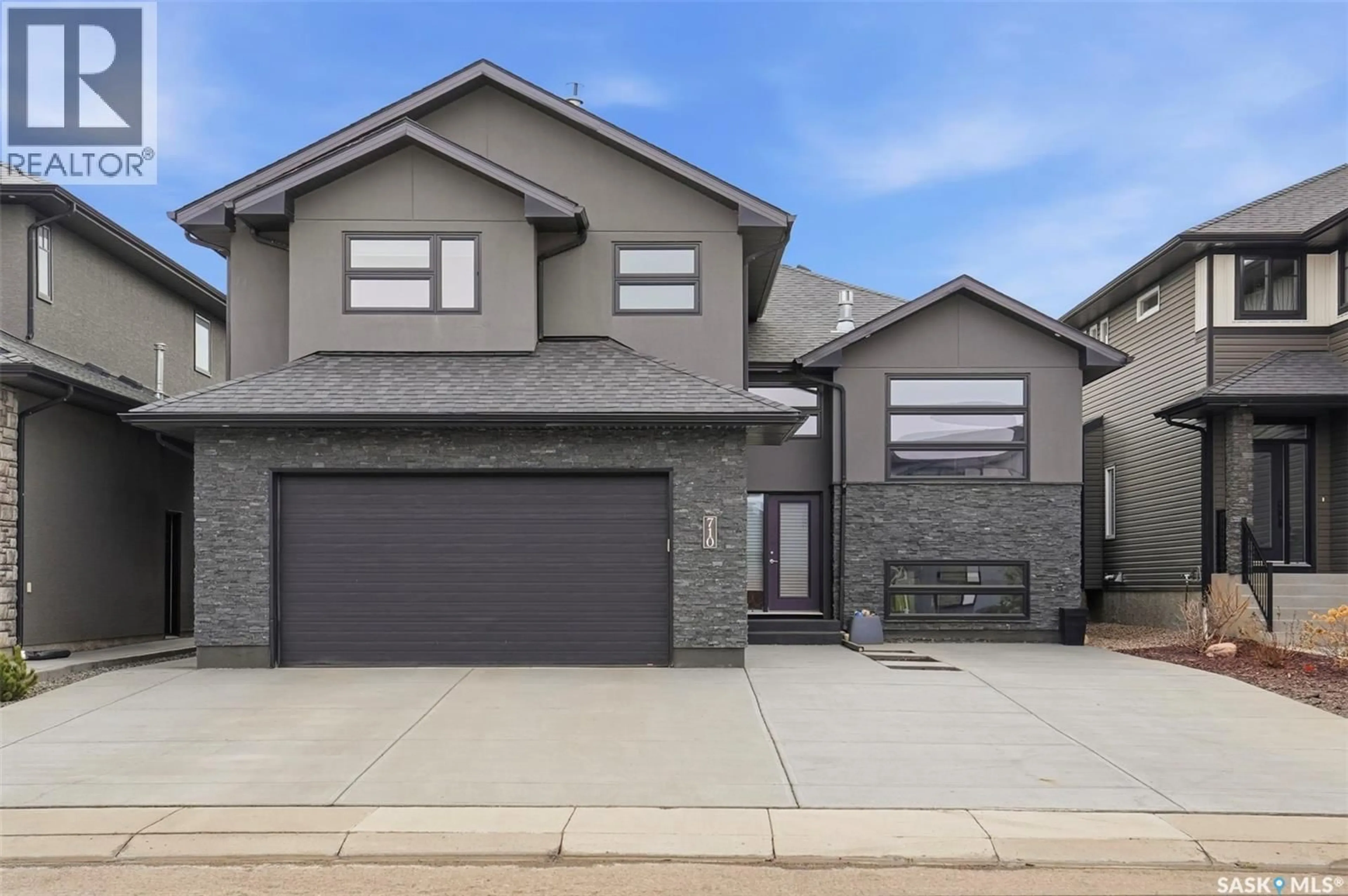 Home with brick exterior material, street for 710 SAUER CRESCENT, Saskatoon Saskatchewan S7W0J8