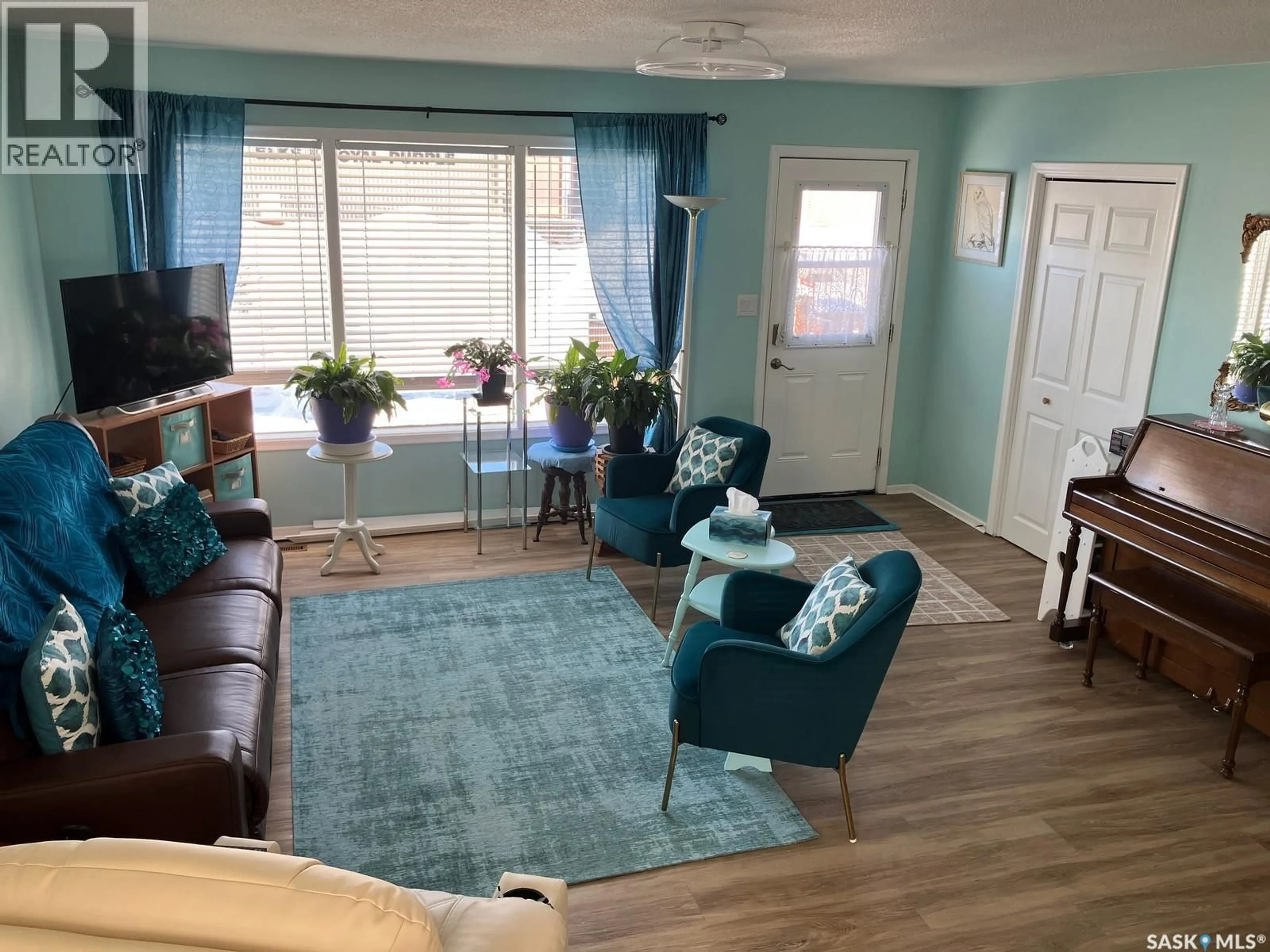 Living room with furniture, unknown for 311 1ST STREET, Nipawin Saskatchewan S0E1E0