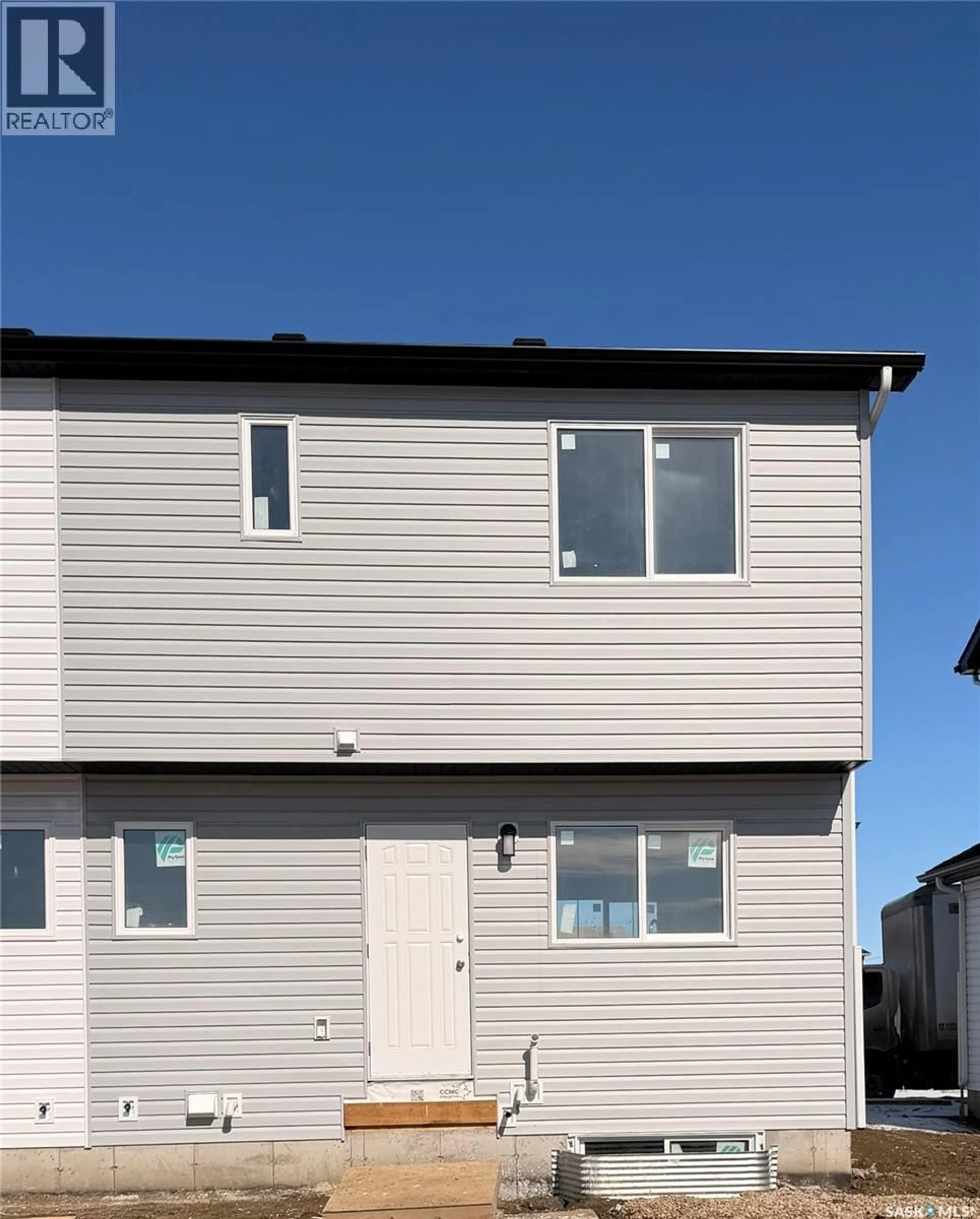 Home with vinyl exterior material, building for 2 101 MIROND ROAD, Martensville Saskatchewan S0K2T1