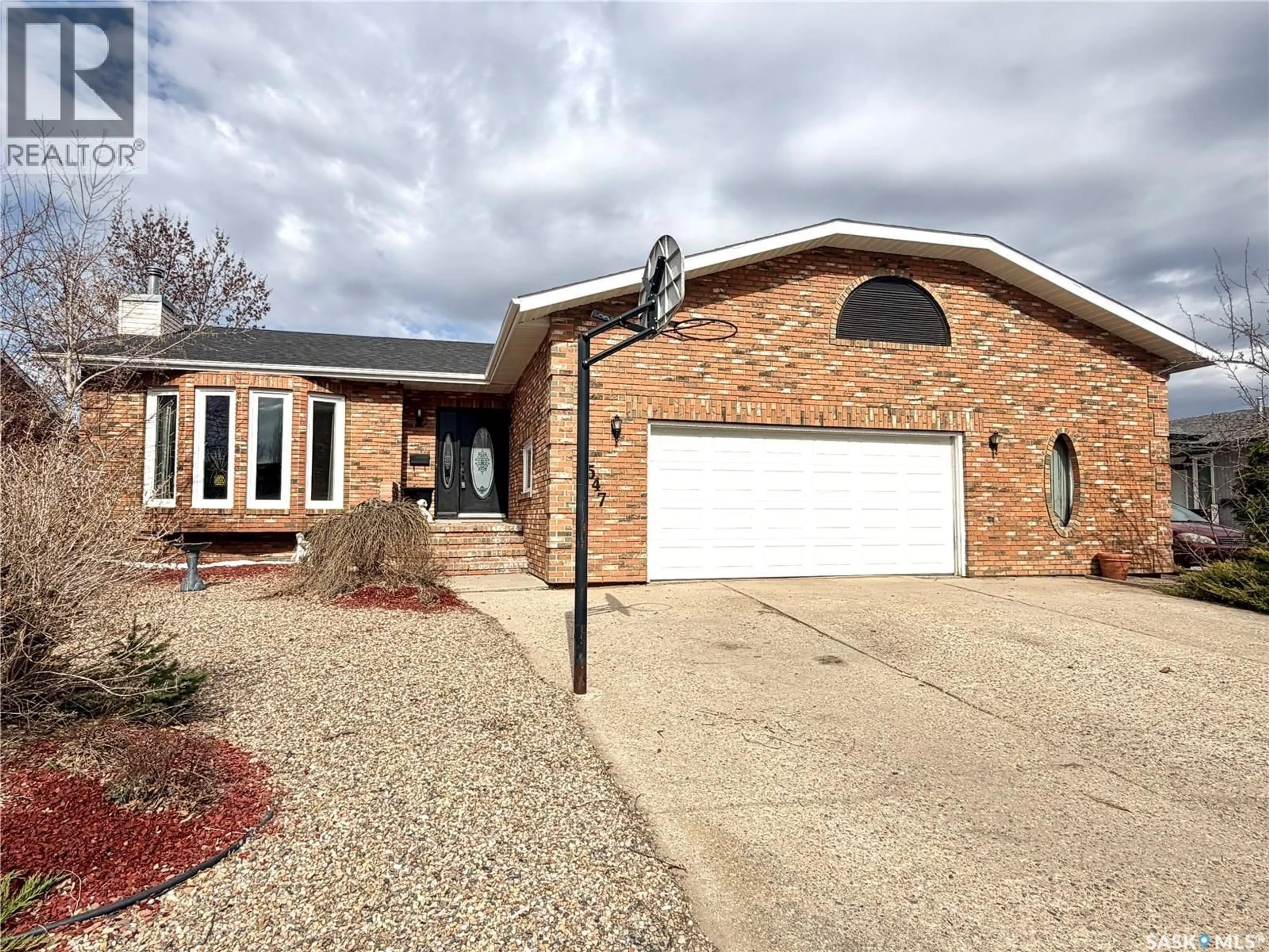 Home with brick exterior material, street for 2547 CARDINAL CRESCENT, North Battleford Saskatchewan S9A3X1