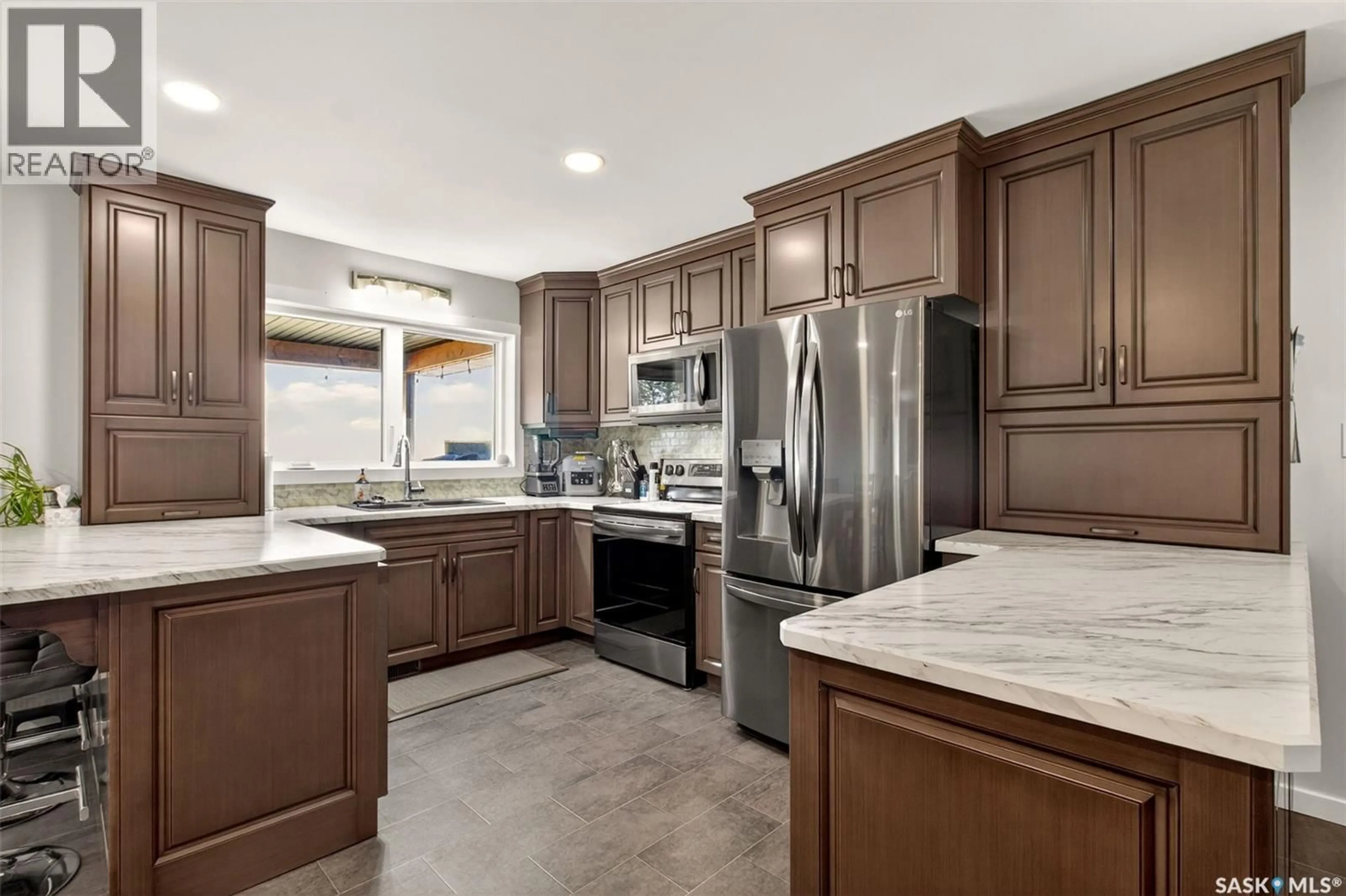 Open concept kitchen, ceramic/tile floor for HOFFMAN ACREAGE, Lakeside Rm No. 338 Saskatchewan S0K4V0