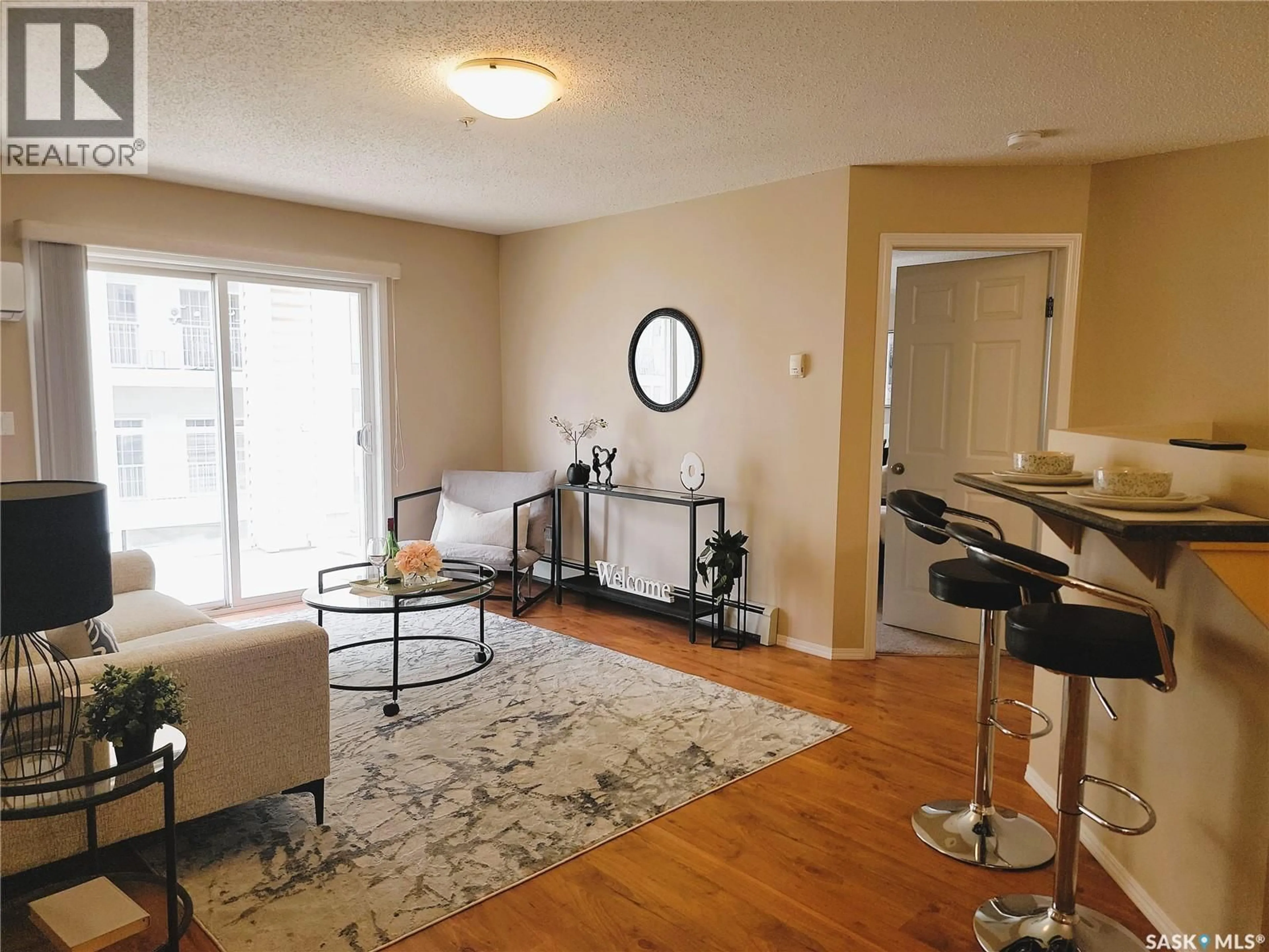 Living room with furniture, unknown for 204 - 303 LOWE ROAD, Saskatoon Saskatchewan S7S1P2