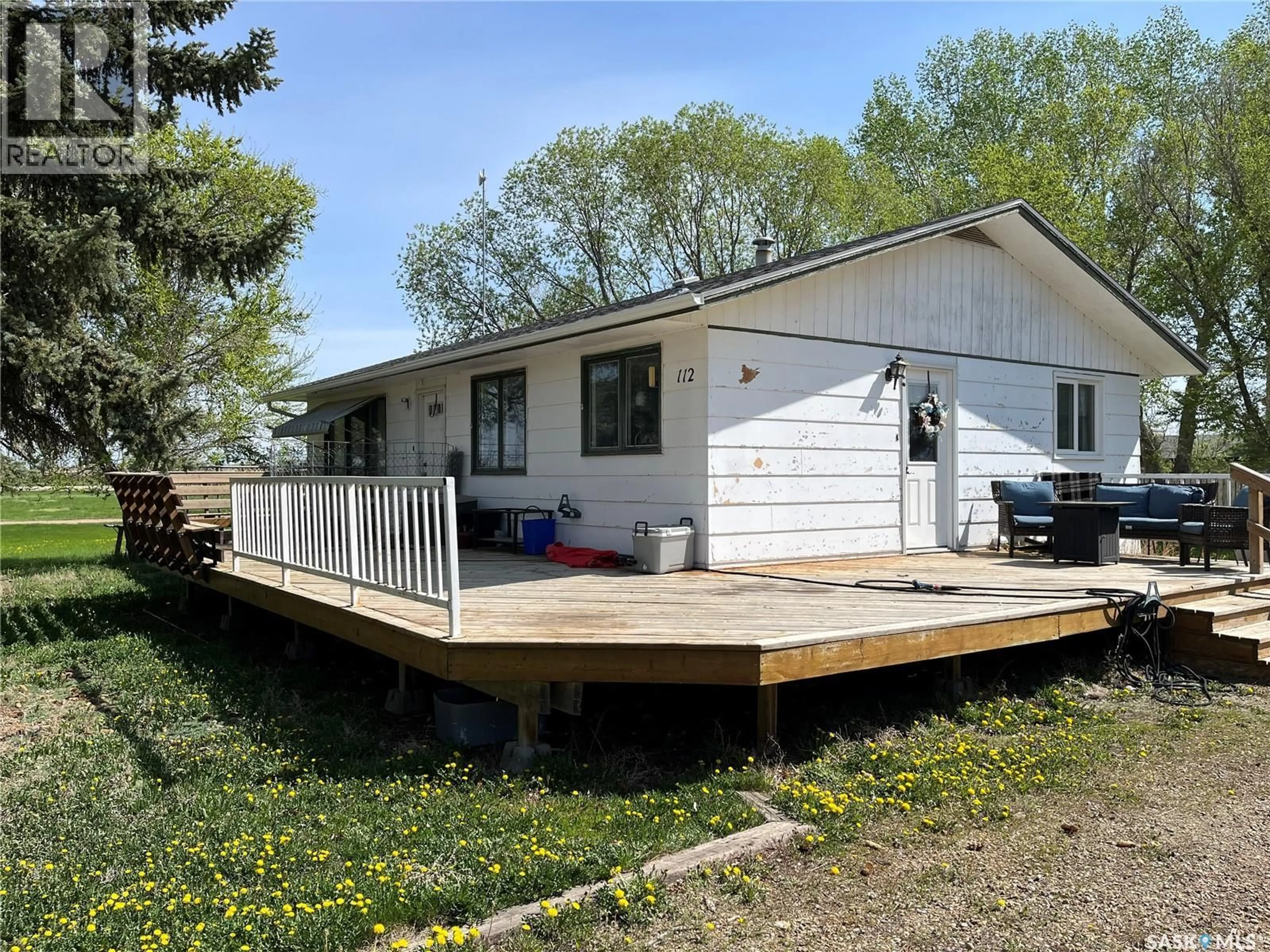 Home with vinyl exterior material, street for 112 EDWARD STREET, Hazenmore Saskatchewan S0N1C0