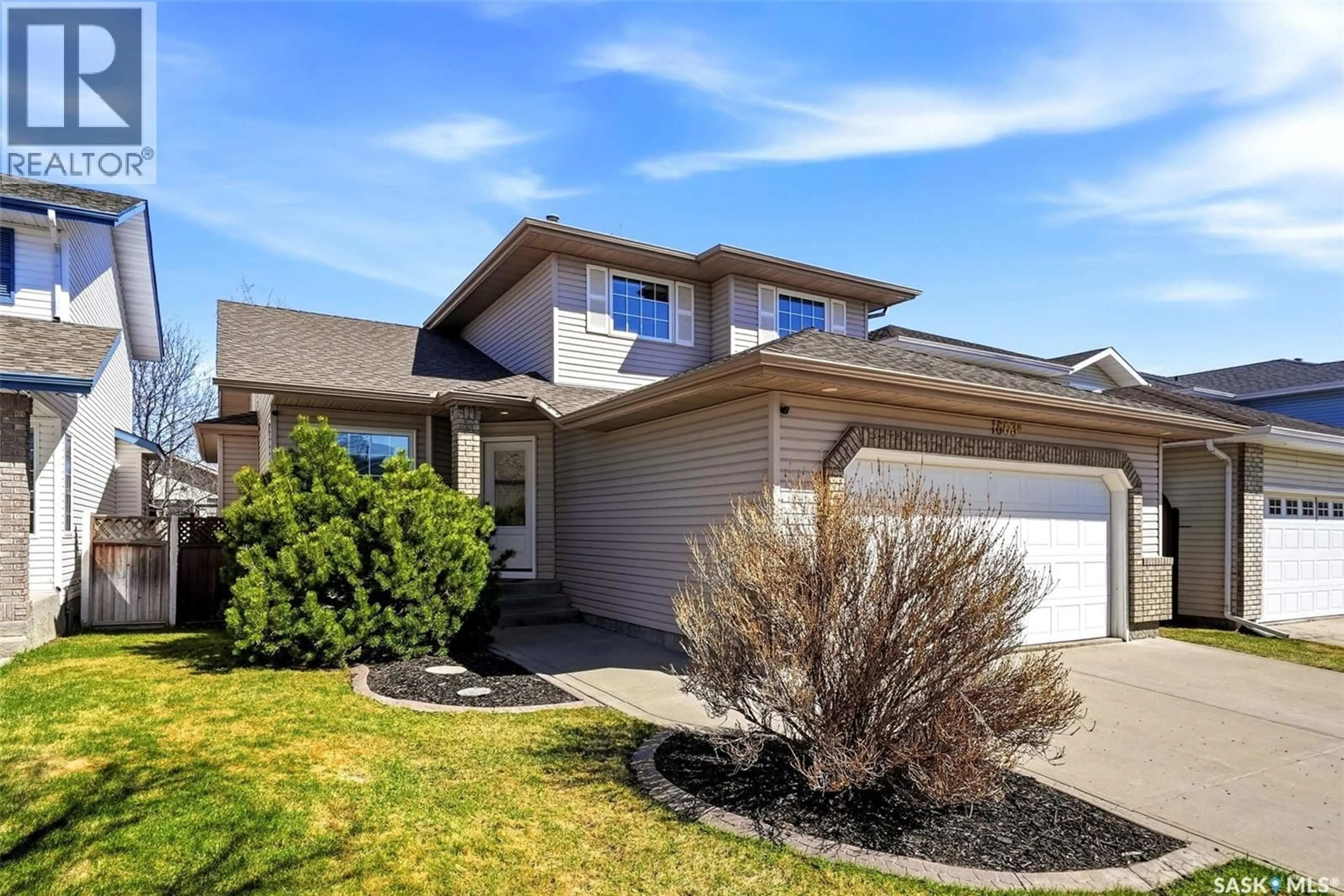 Home with vinyl exterior material, street for 1603 ROUSSEAU CRESCENT, Regina Saskatchewan S4X4L7